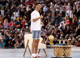 Photo) Cristiano Ronaldo collects Top Scorer of All-Time award in Dubai