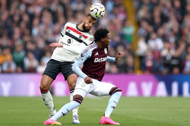 BIRMINGHAM, ENGLAND - OCTOBER 06: Noussair Mazraoui of Manchester United is challenged by Jaden Philogene-Bidace of Aston Villa during the Premier League match between Aston Villa FC and Manchester United FC at Villa Park on October 06, 2024 in Birmingham, England.