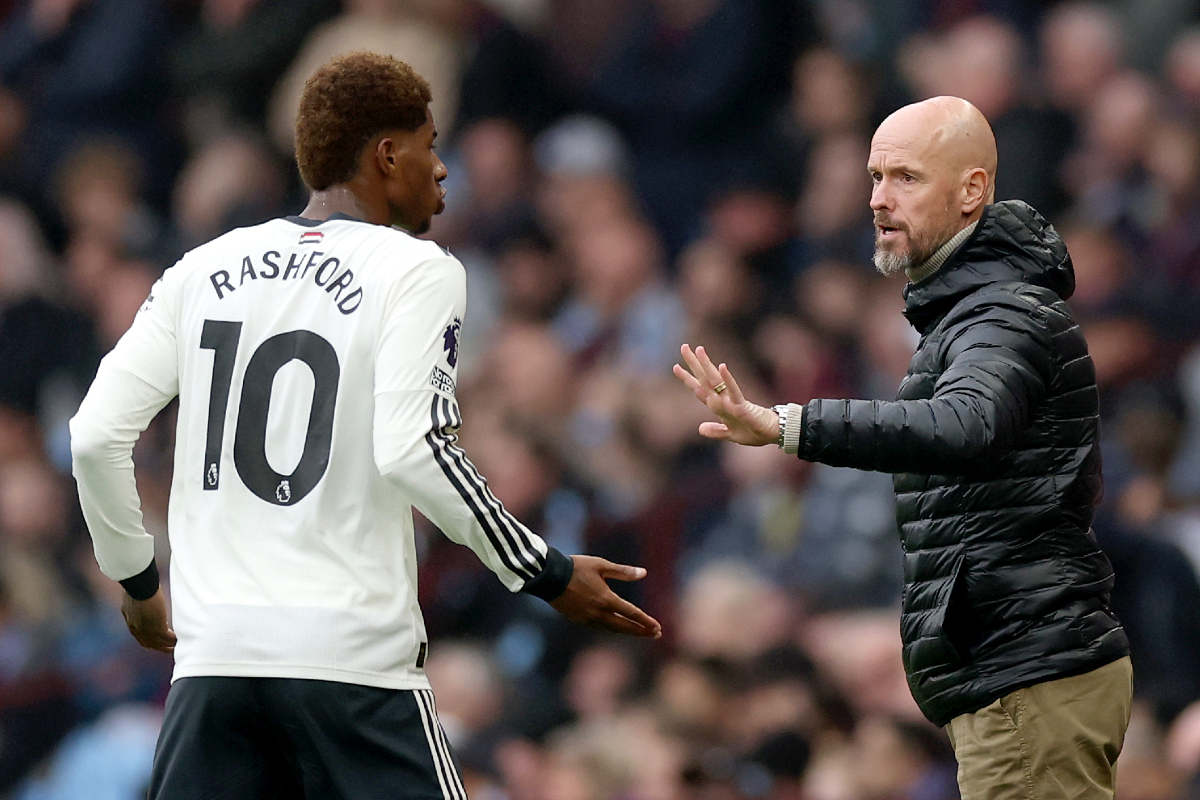 Marcus Rashford takes orders from Erik ten Hag on the touchline.