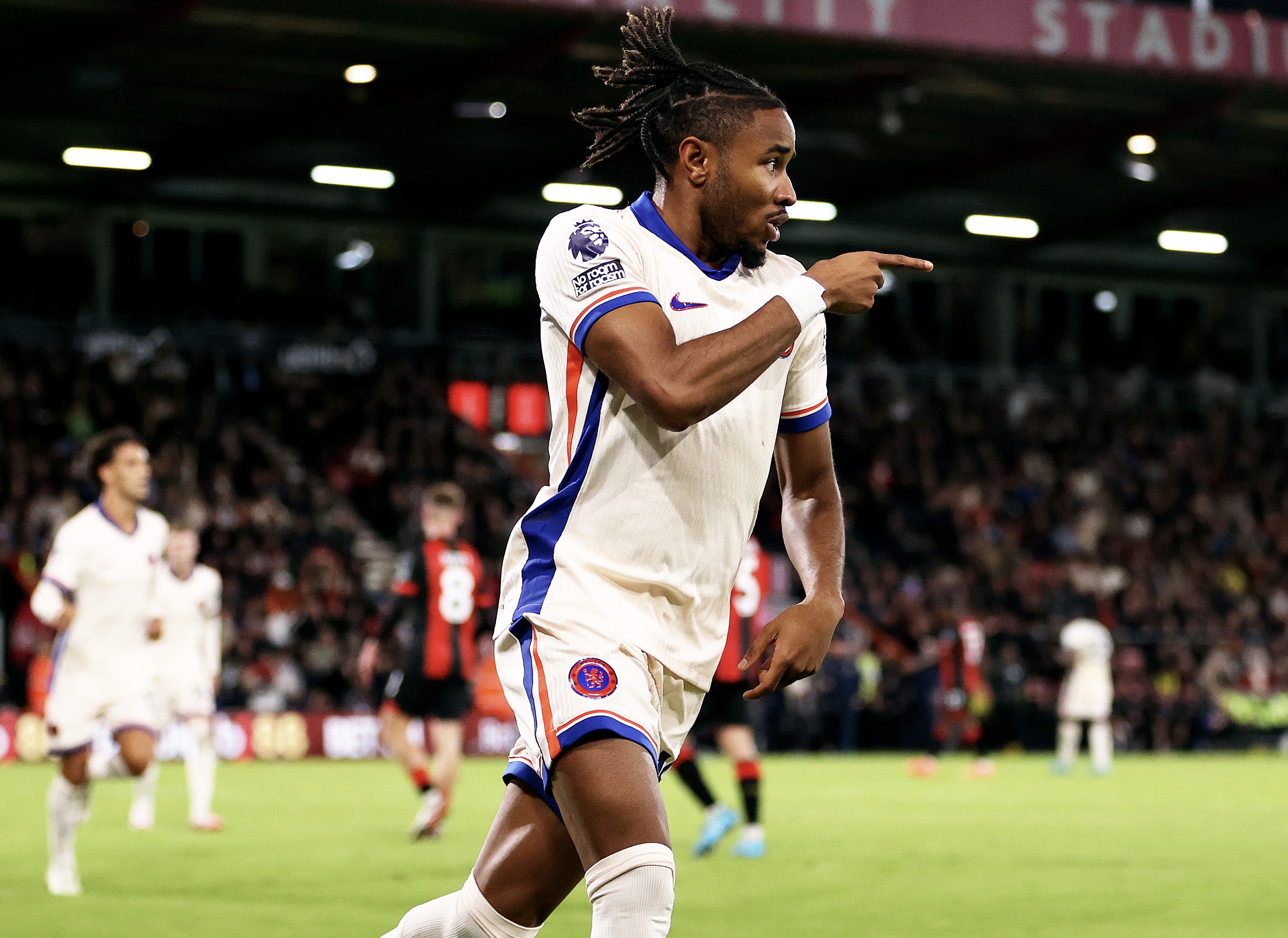 Christopher Nkunku celebrates scoring a goal for Chelsea