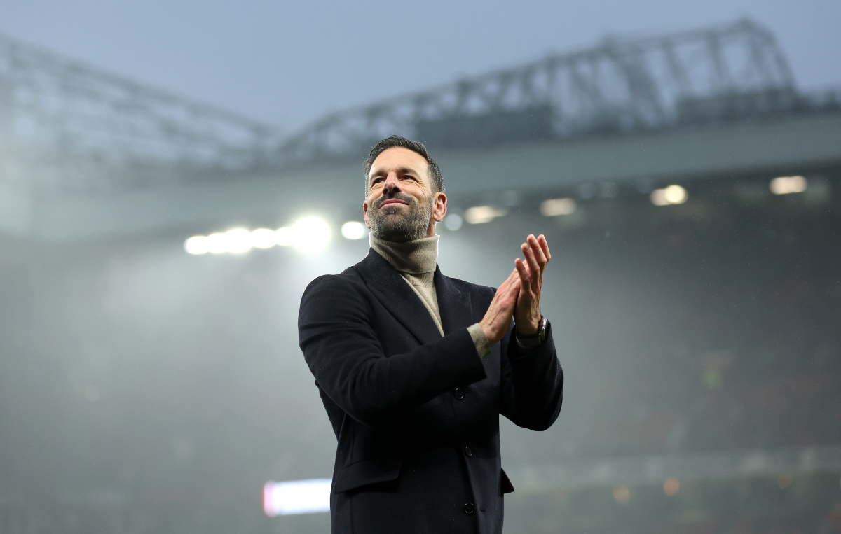 Ruud van Nistelrooy applauds the fans at Old Trafford.