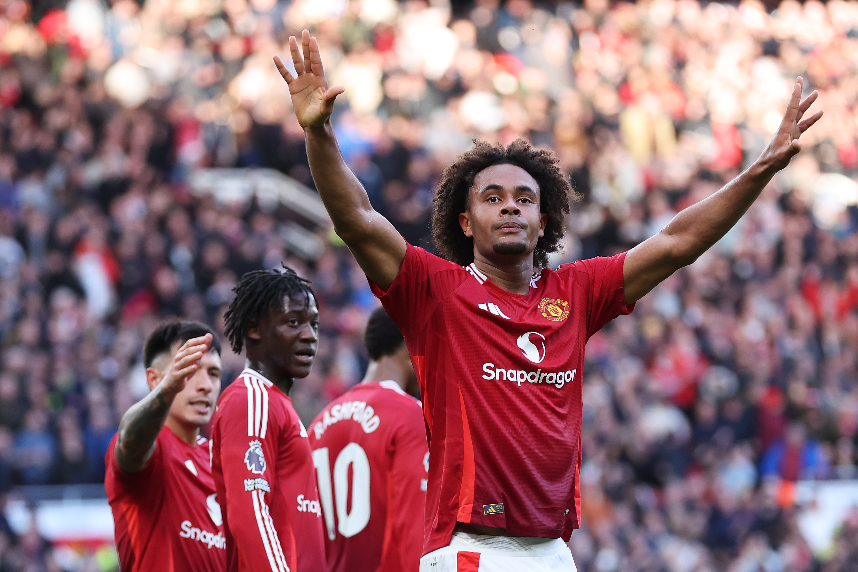 Joshua Zirkzee celebrates his goal at Old Trafford.