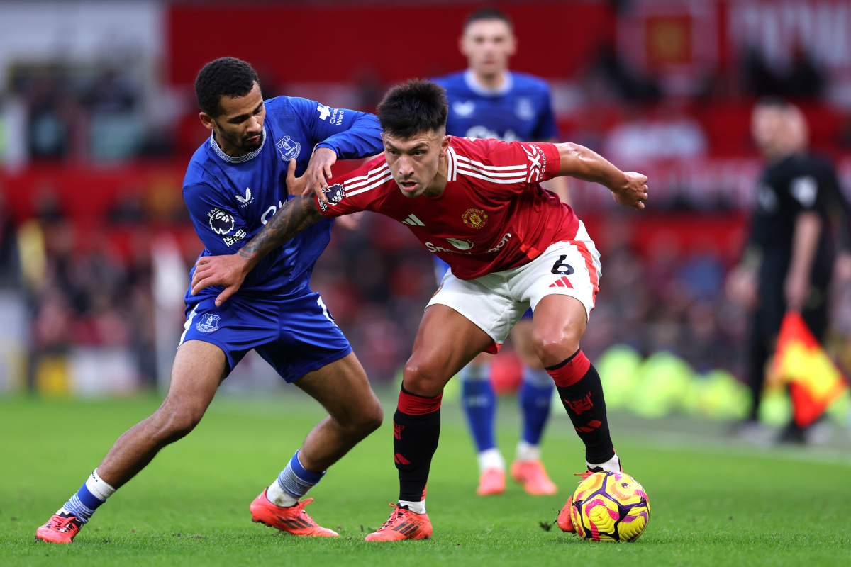 Lisandro Martinez shields the ball from Iliman Ndiaye of Everton.