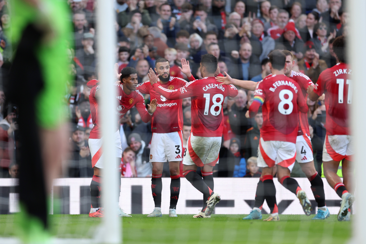 Manchester United players celebrate at Old Trafford.