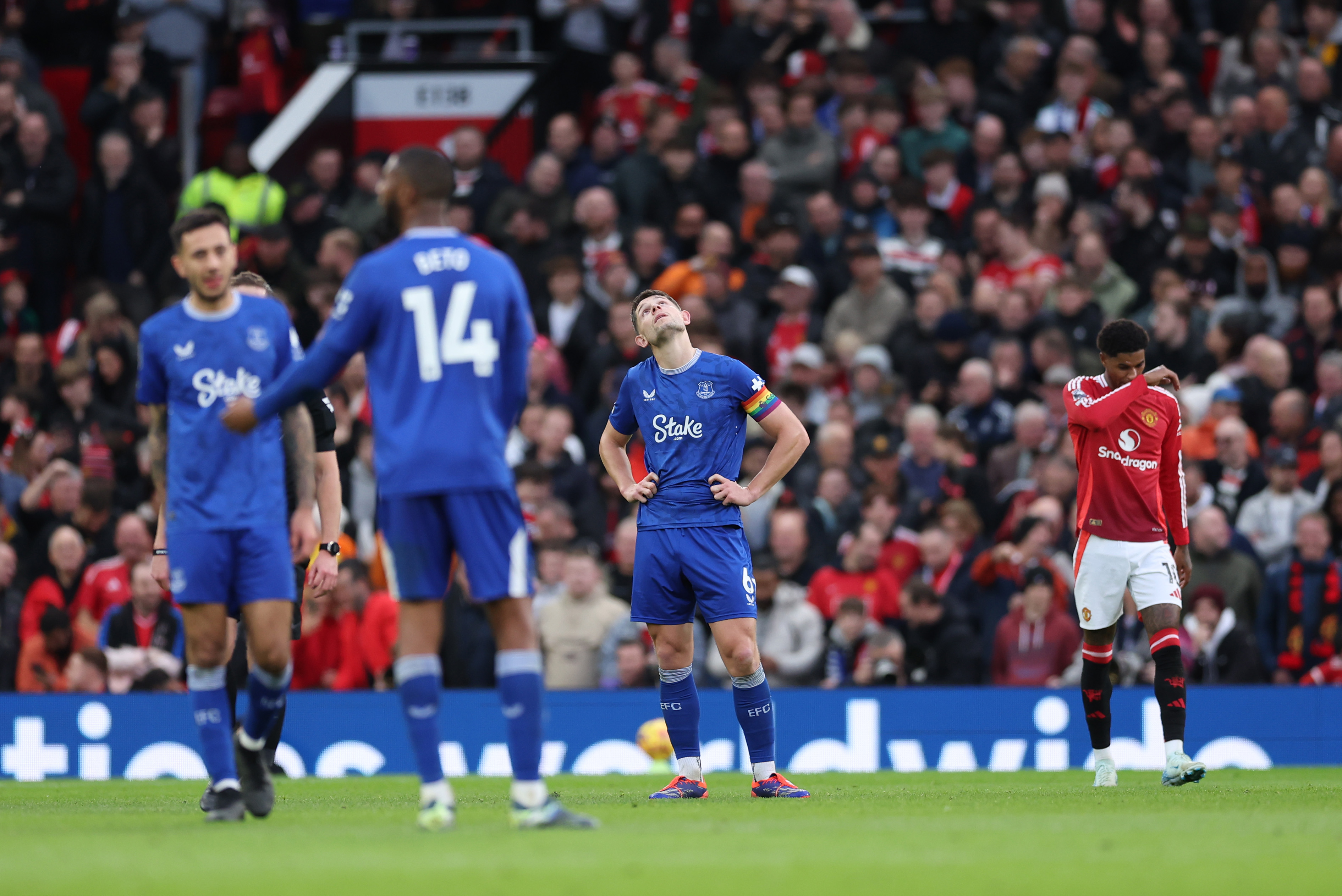 James Tarkowski looks dejected after Man United score their fourth goal vs Everton.