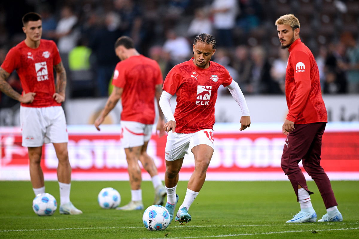 Xavi Simons lines up a shot for Leipzig.