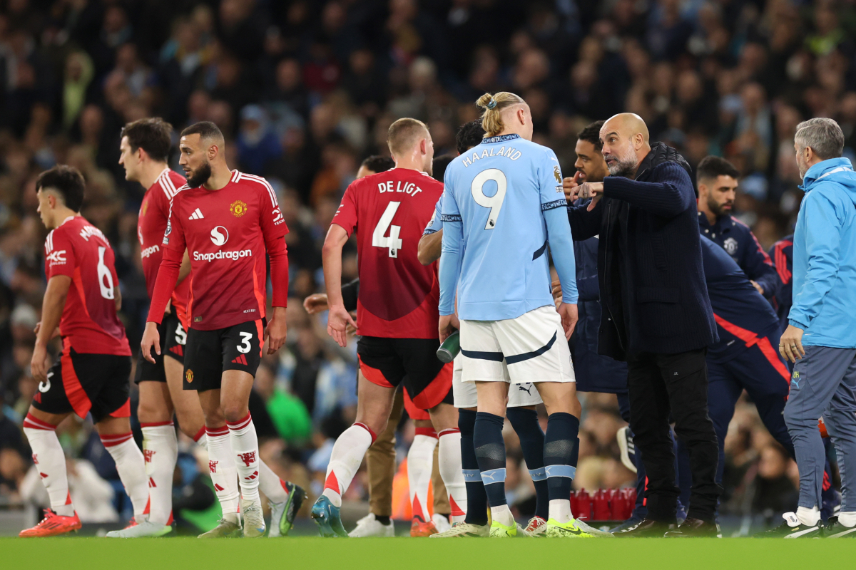 Noussair Mazraoui takes instructions on the touchline.