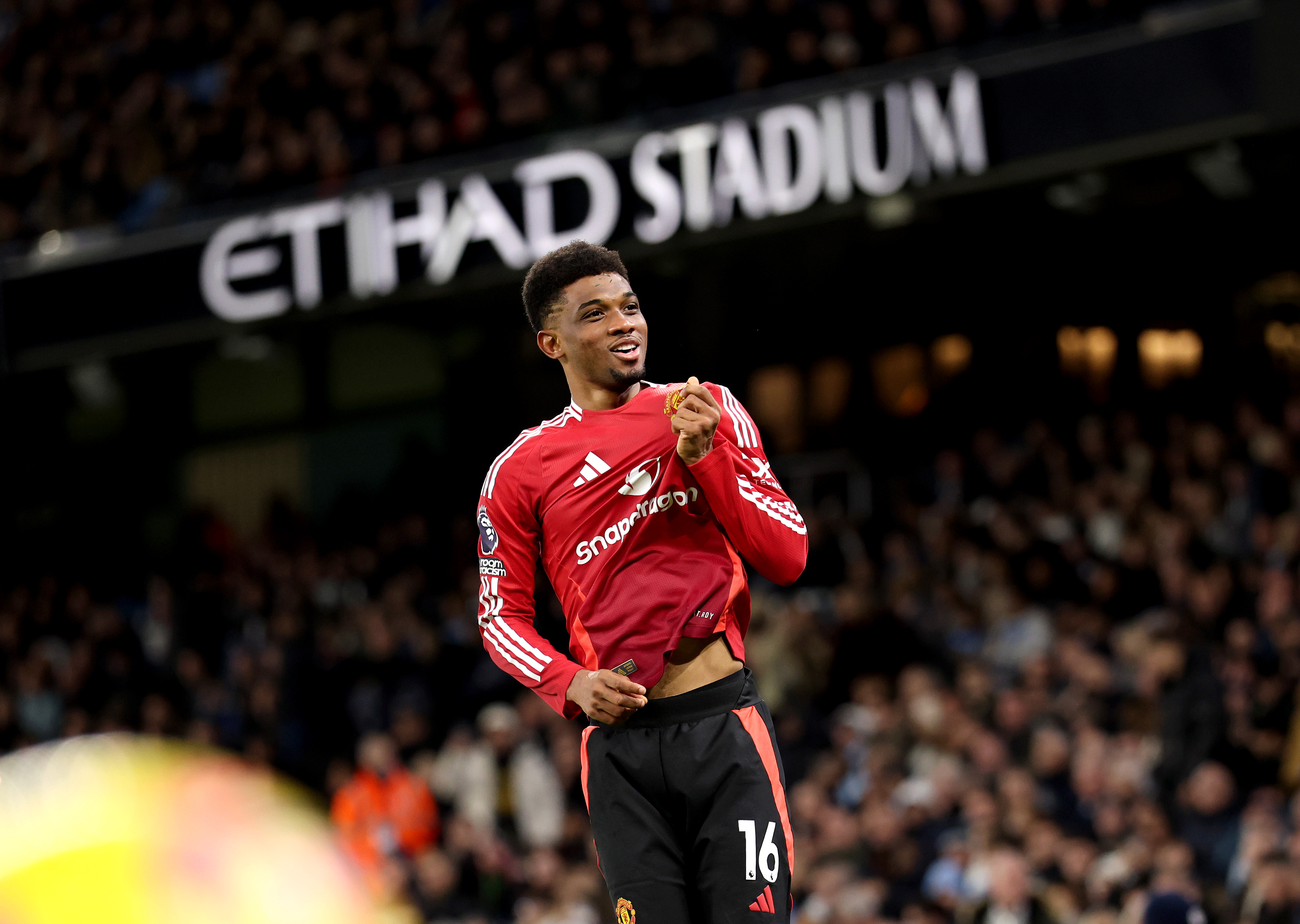 Amad Diallo celebrates his match-winner at the Etihad Stadium.