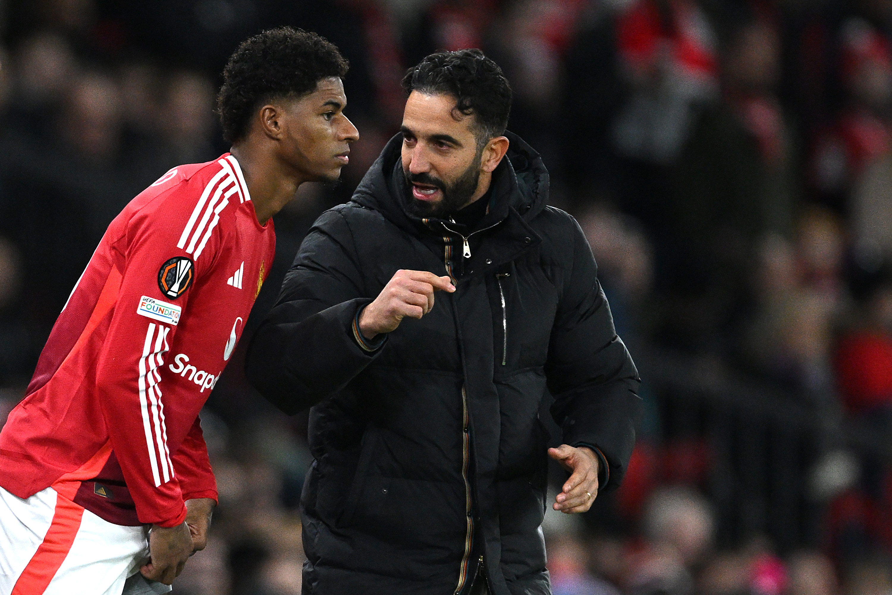 Marcus Rashford and Ruben Amorim on the touchline.