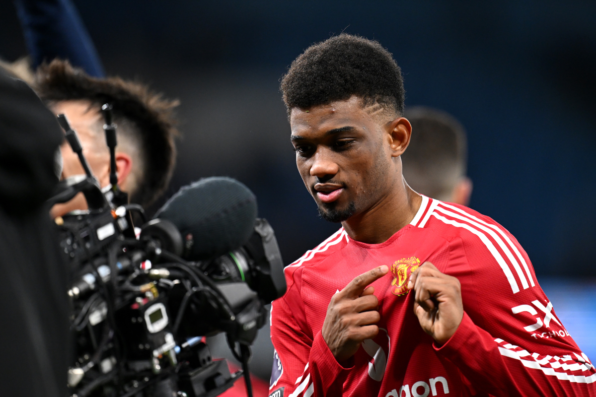 Amad Diallo celebrates his winning goal at the Etihad.