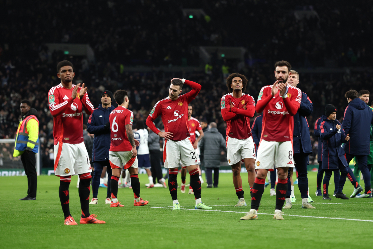 Amad Diallo applauds the away fans.