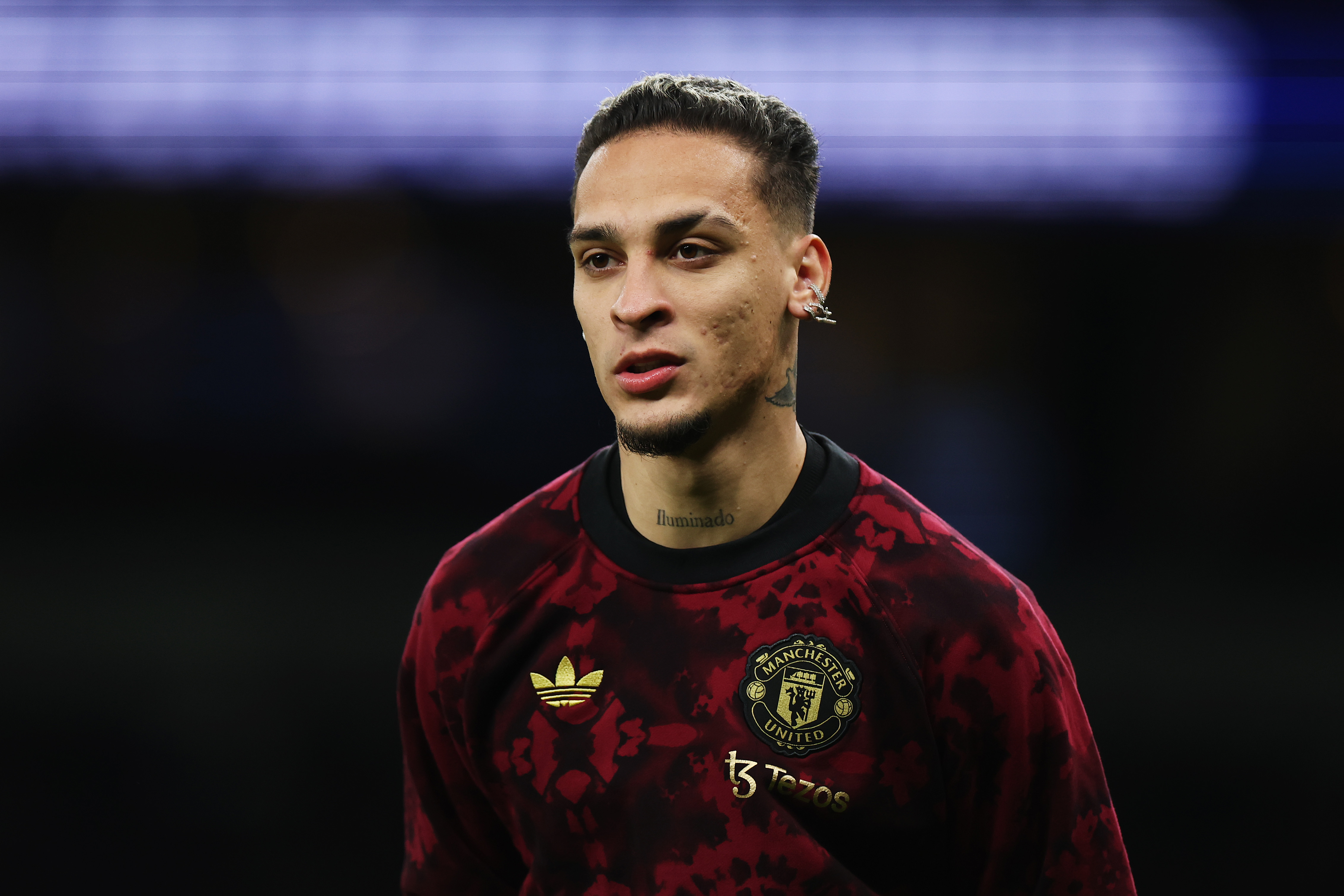 Antony warms up at Tottenham Hotspur Stadium.