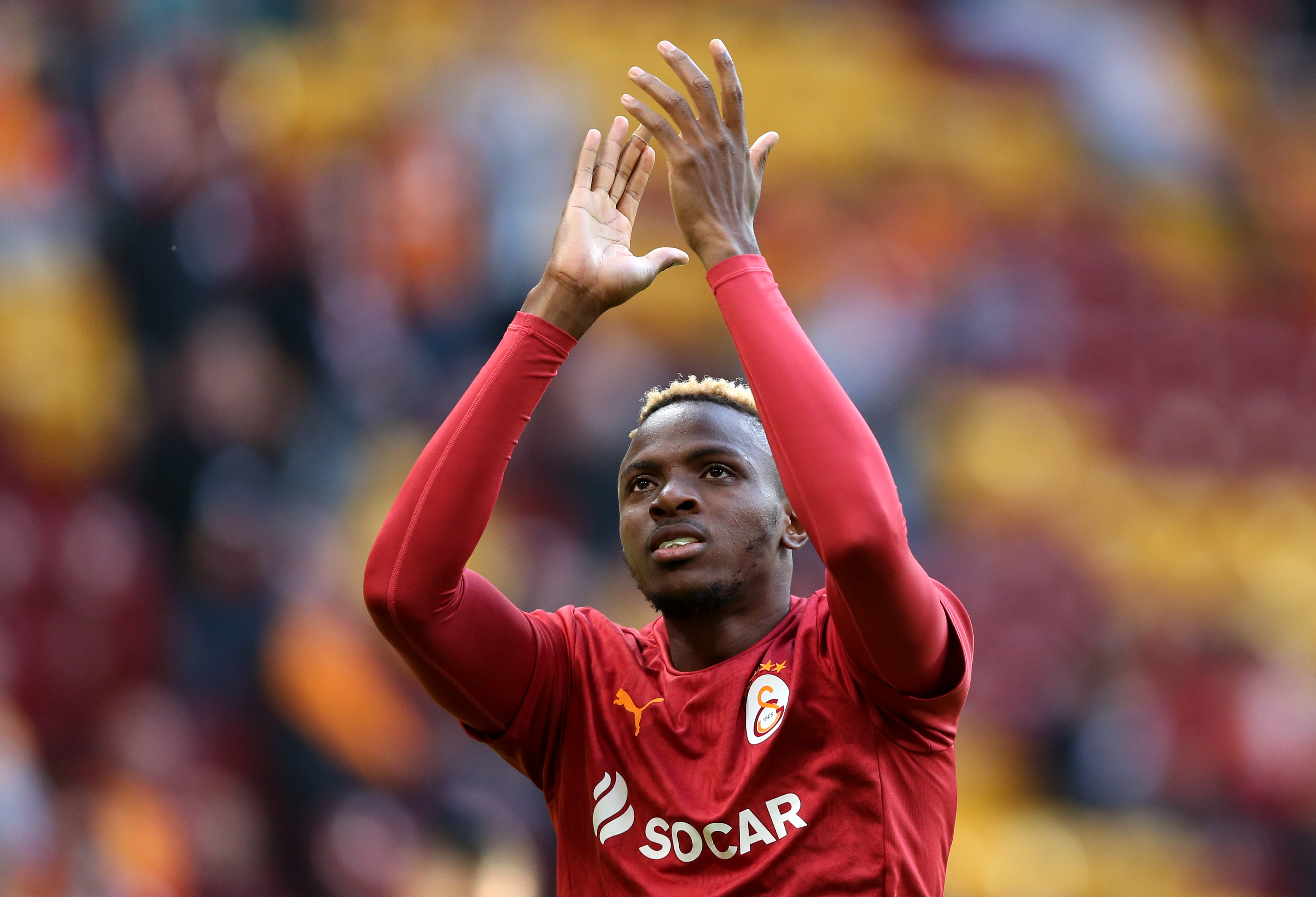 Victor Osimhen applauding Galatasaray fans