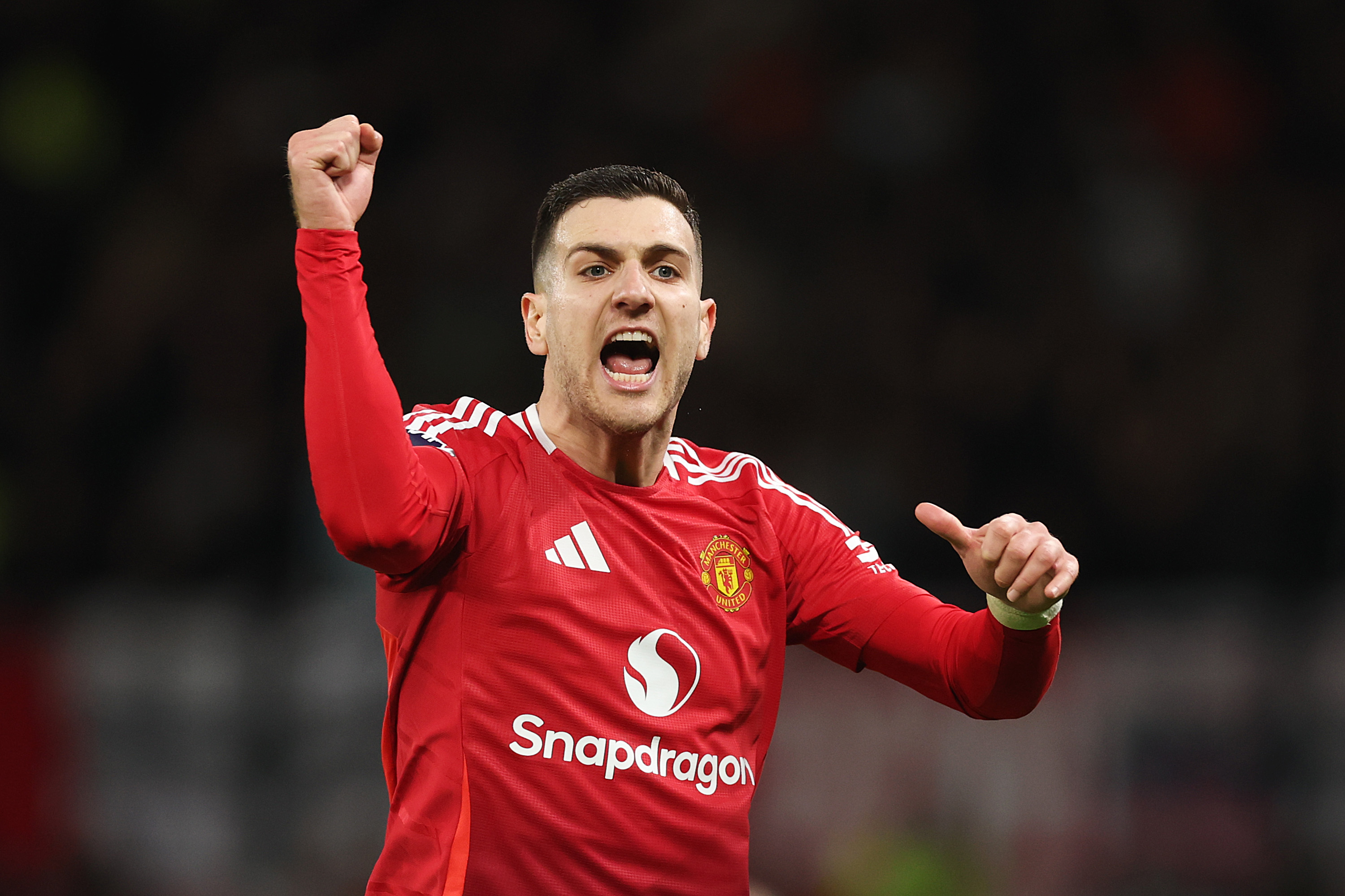 Diogo Dalot celebrating while in action for Man Utd