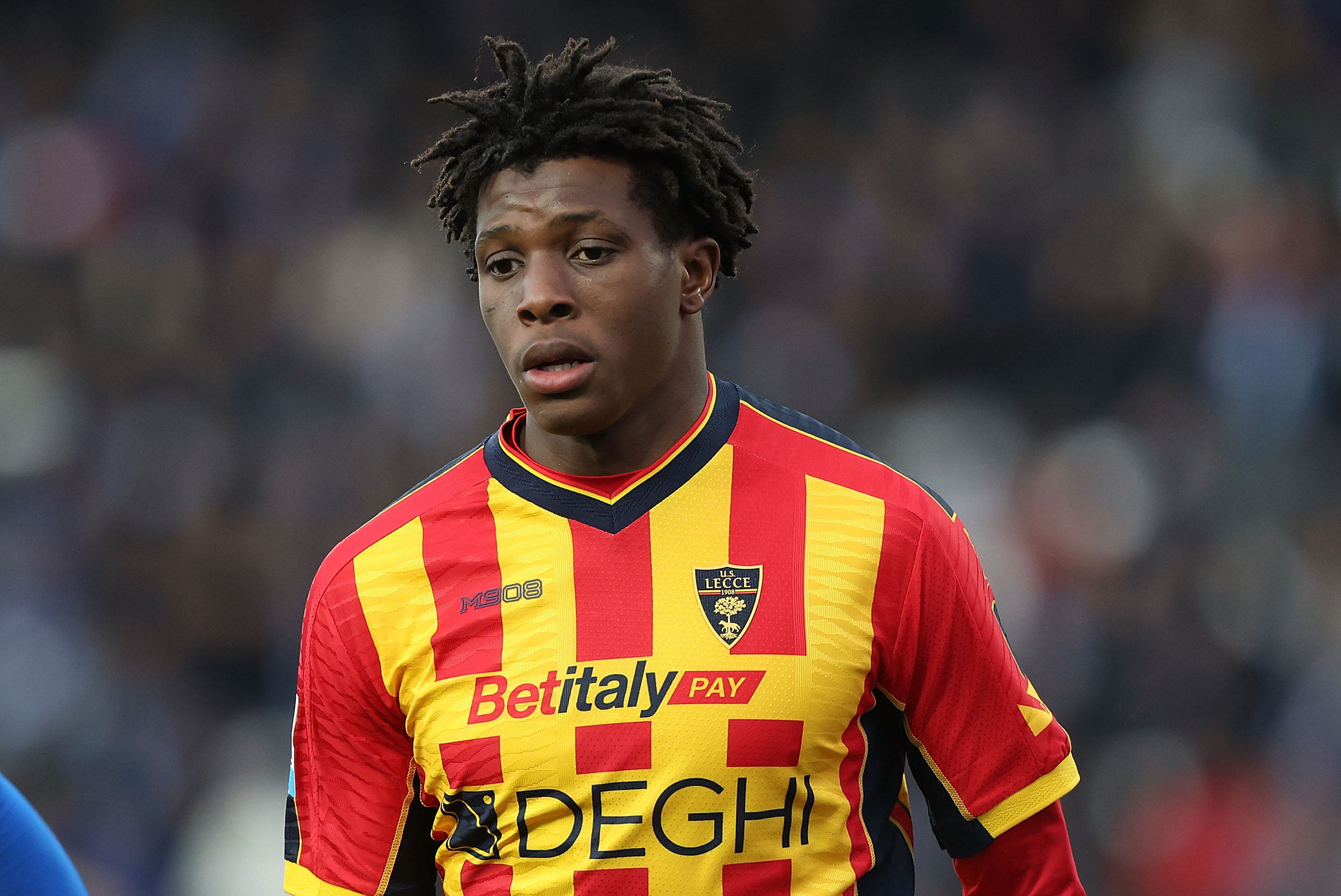 Patrick Dorgu looks on during a Serie A match for Lecce.