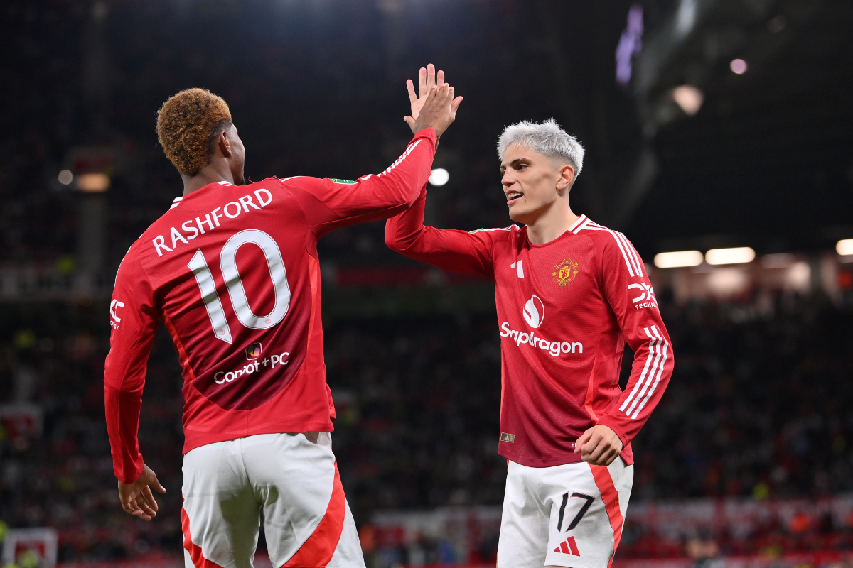 Alejandro Garnacho high-fives Marcus Rashford after scoring for Man United.