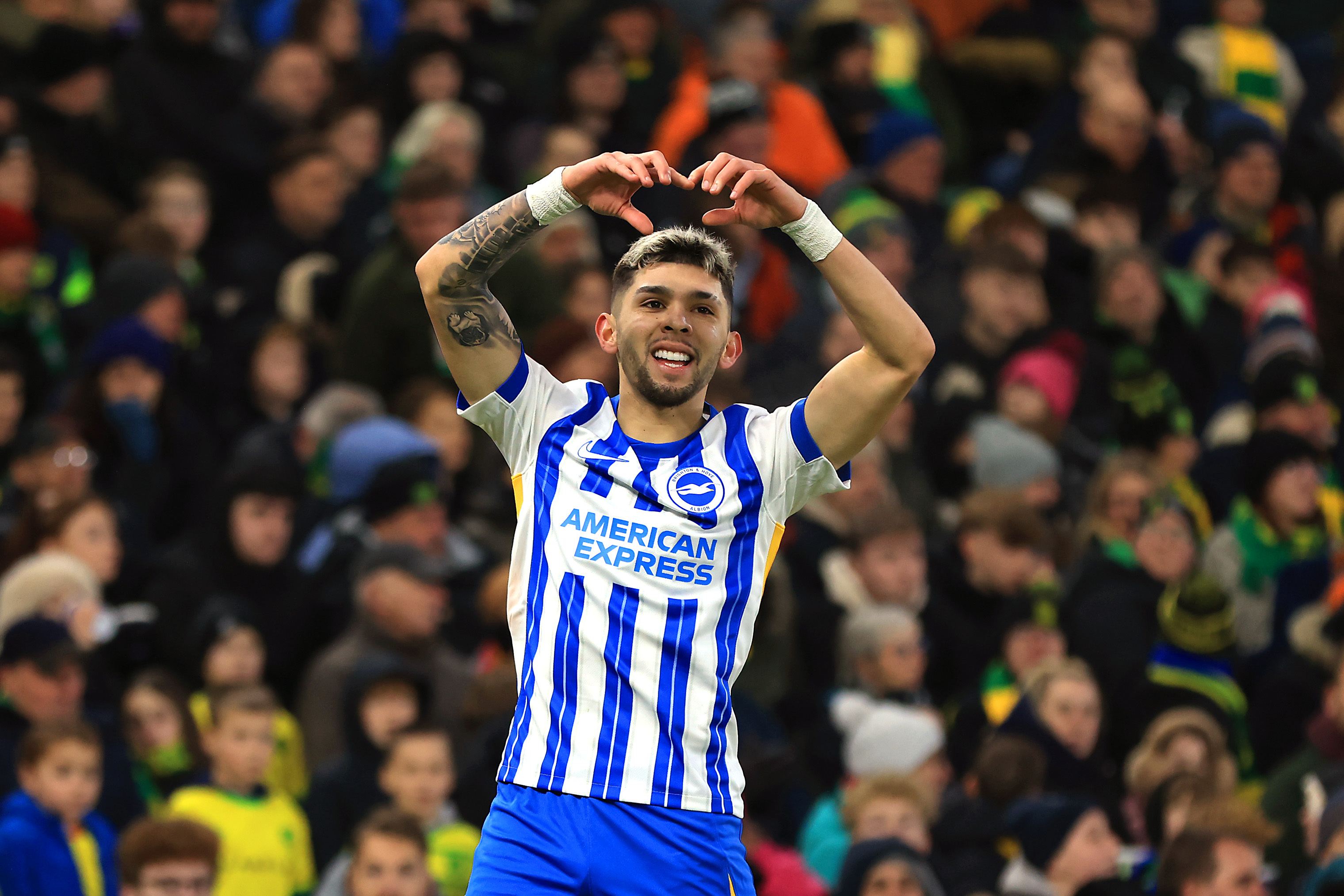 Julio Enciso celebrates with a heart after scoring for Brighton in the FA Cup third round.