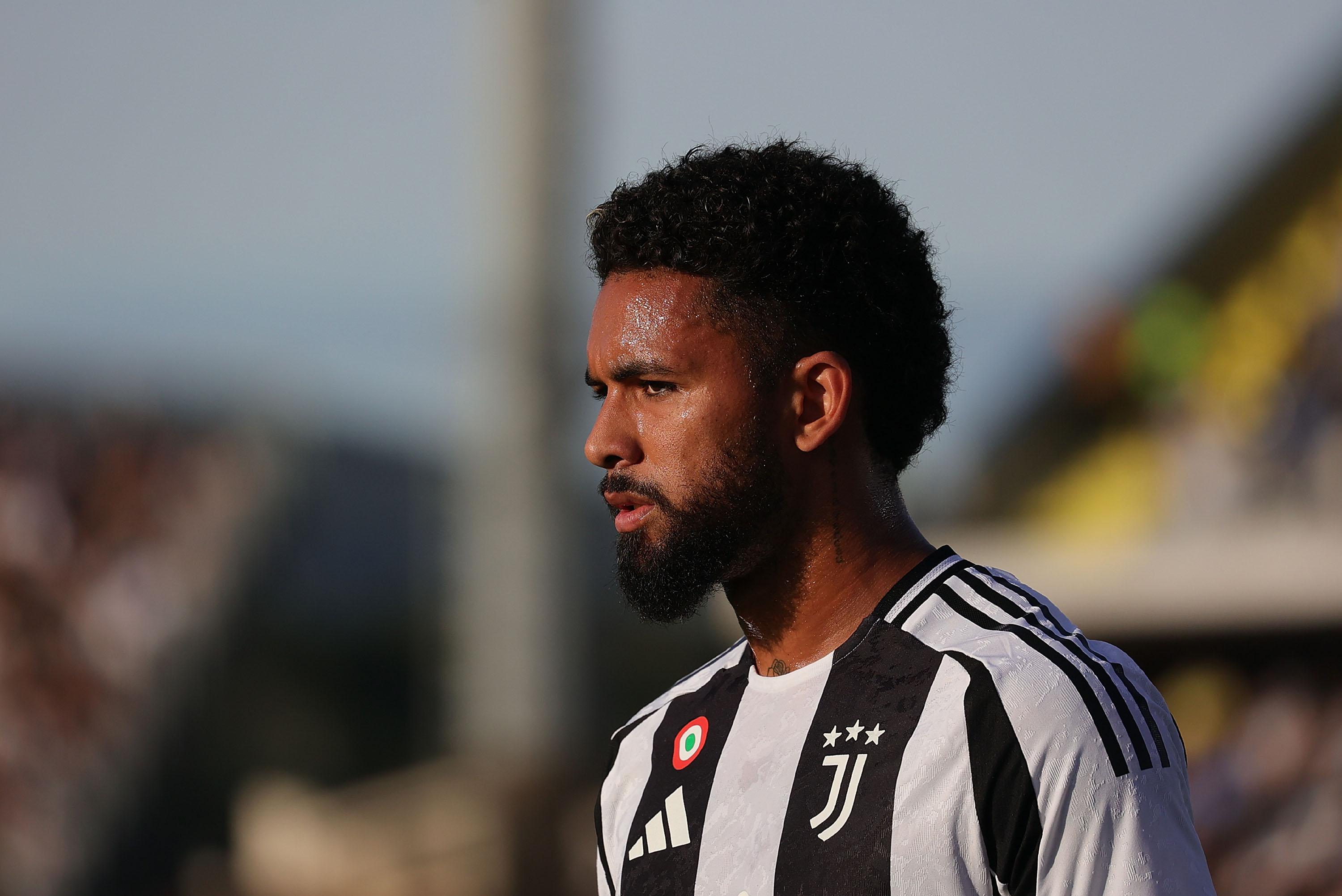 Douglas Luiz looks on while in action for Juventus.