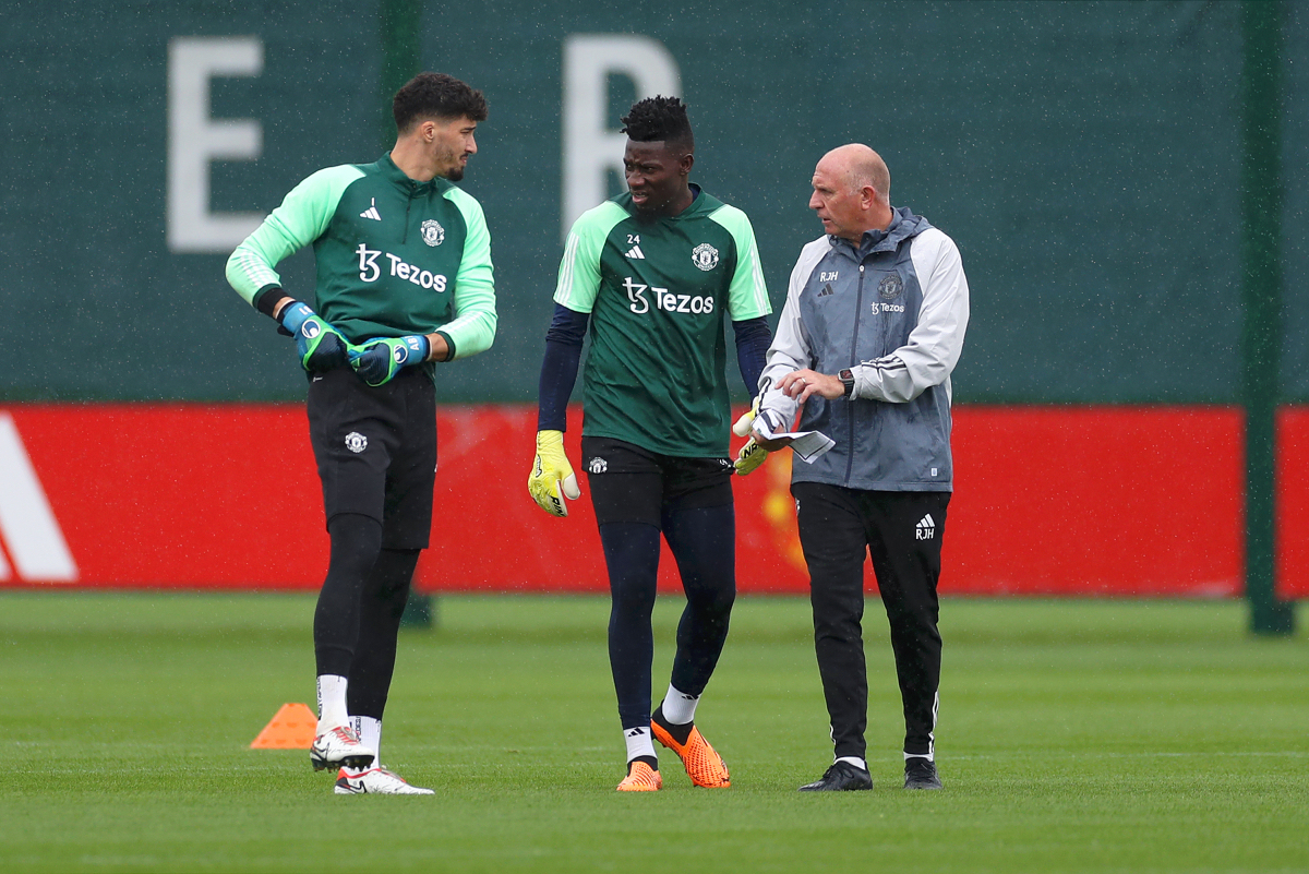 Altay Bayindir and Andre Onana prepare for training at Carrington.