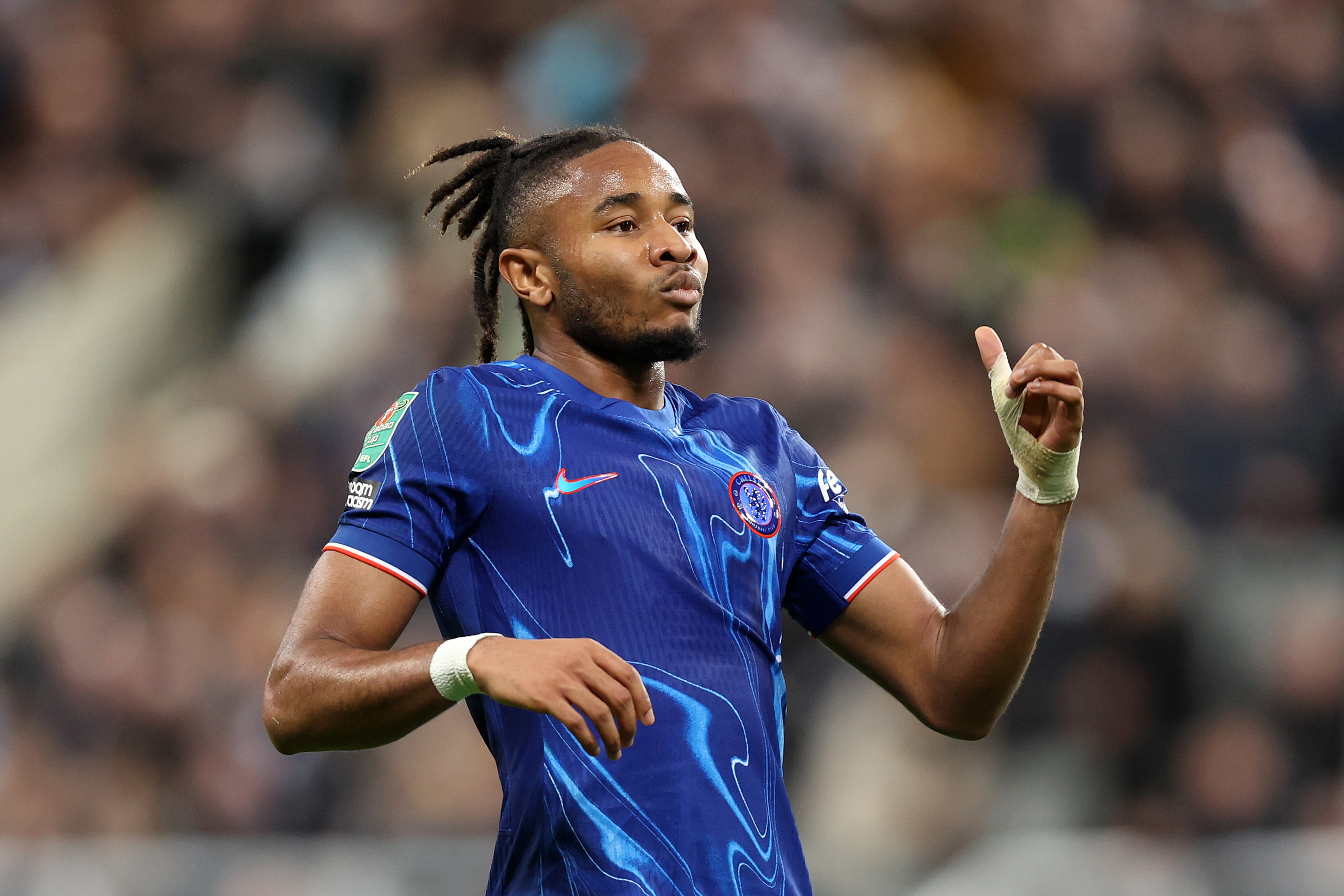 Christopher Nkunku in action for Chelsea in a Carabao Cup match.