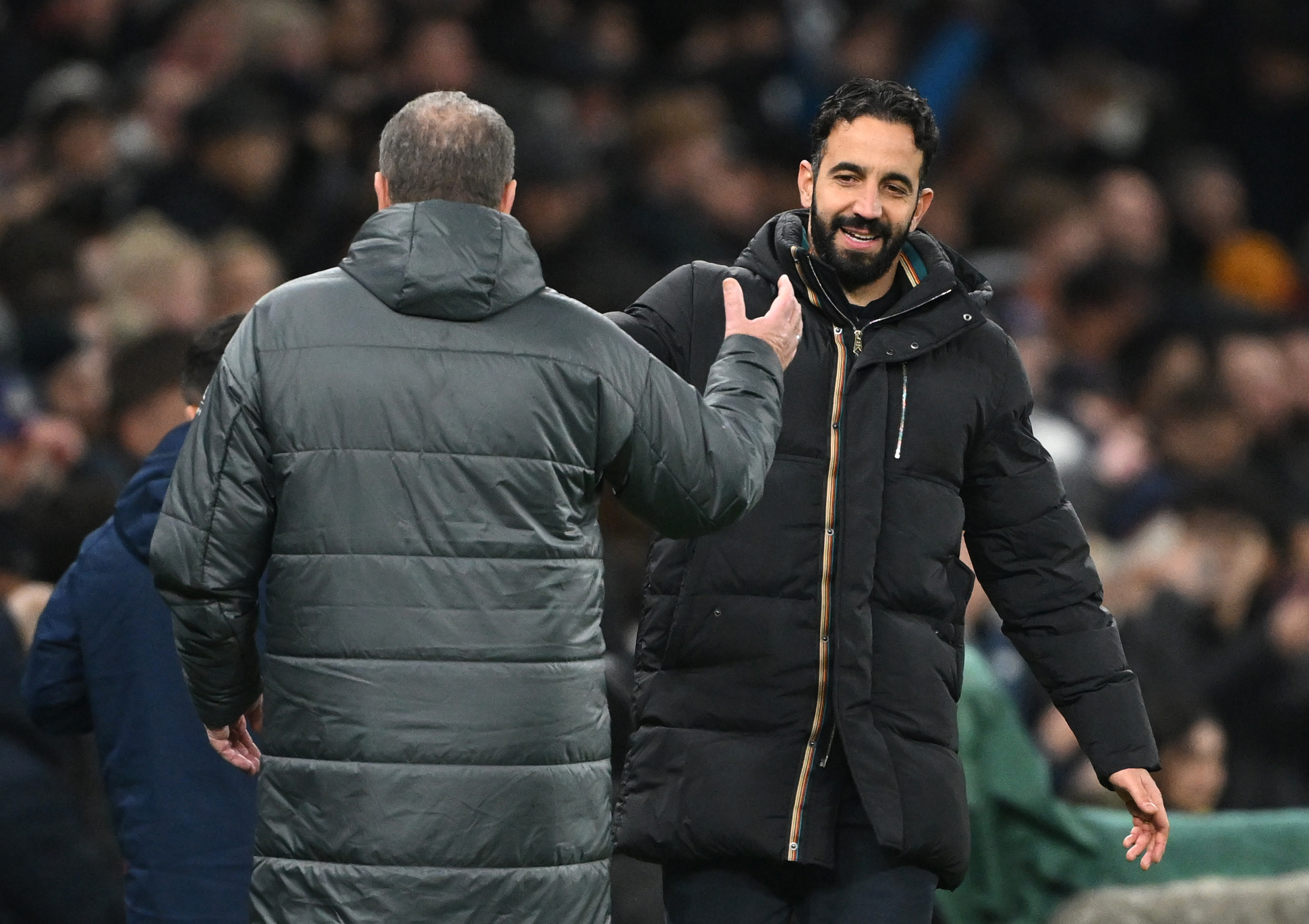 Ruben Amorim greets Ange Postecoglou on the touchline ahead of kick-off.