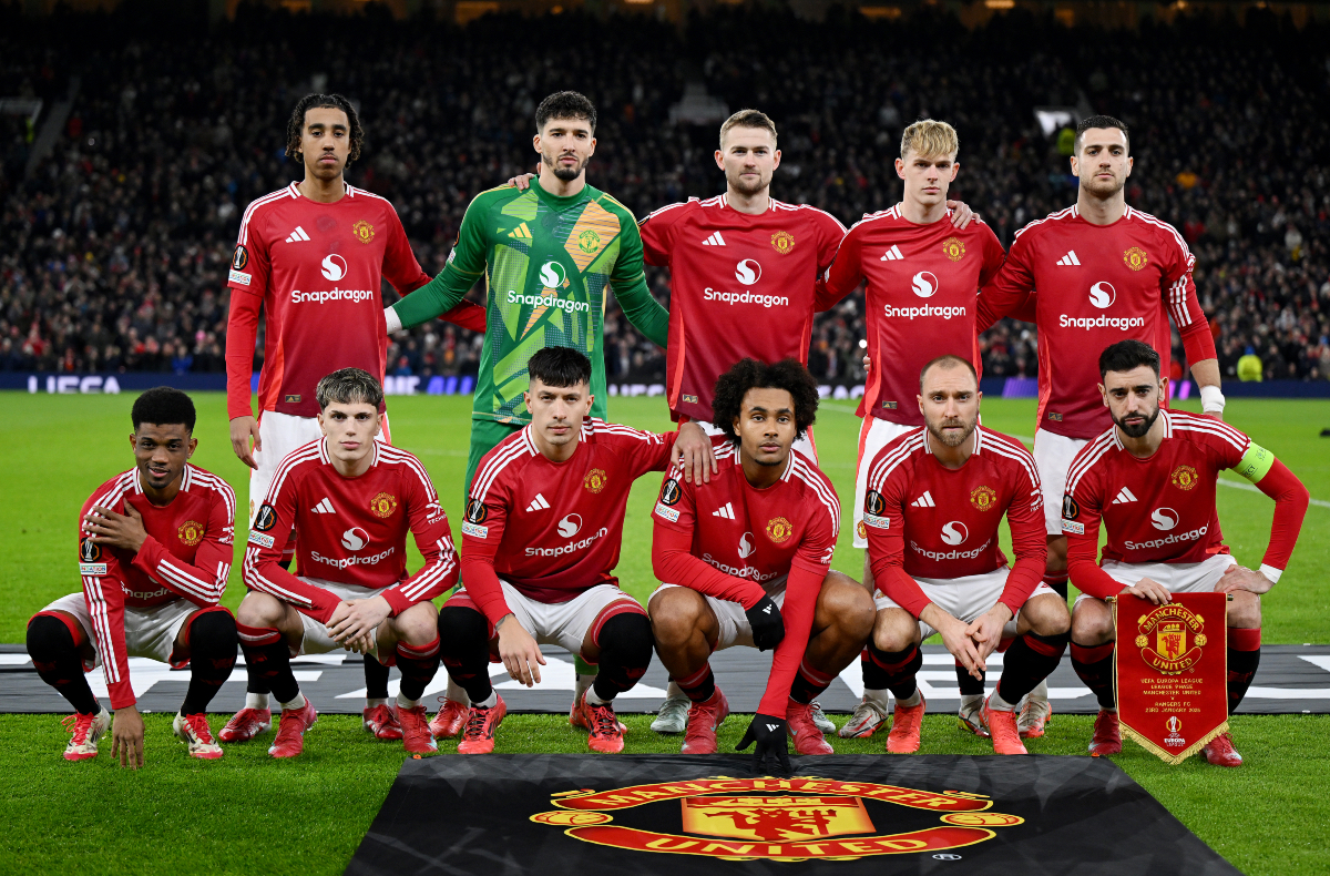 Leny Yoro poses for a pre-match picture with his teammates at Old Trafford.