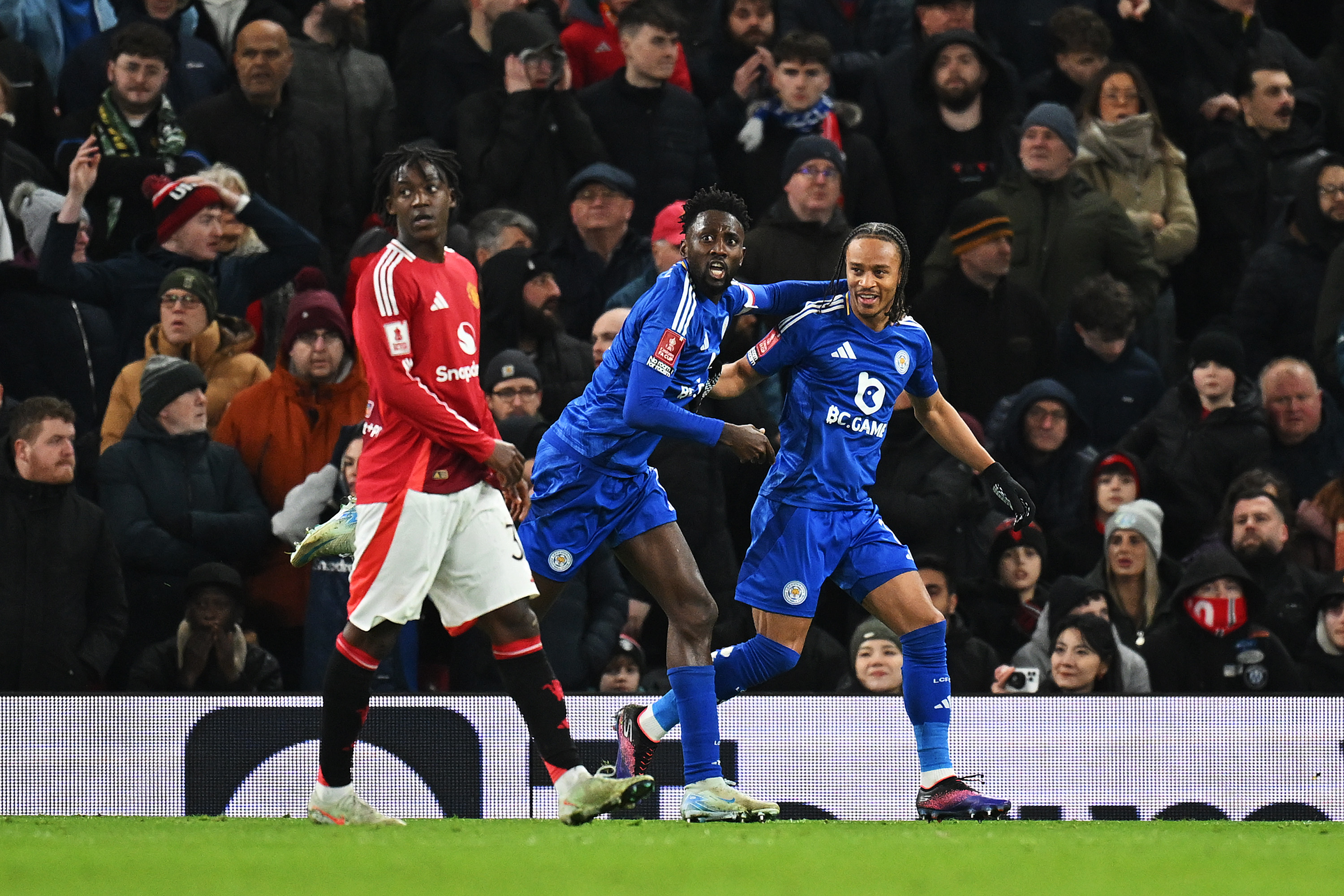 Kobbie Mainoo reacts at Leicester take the lead at Old Trafford.