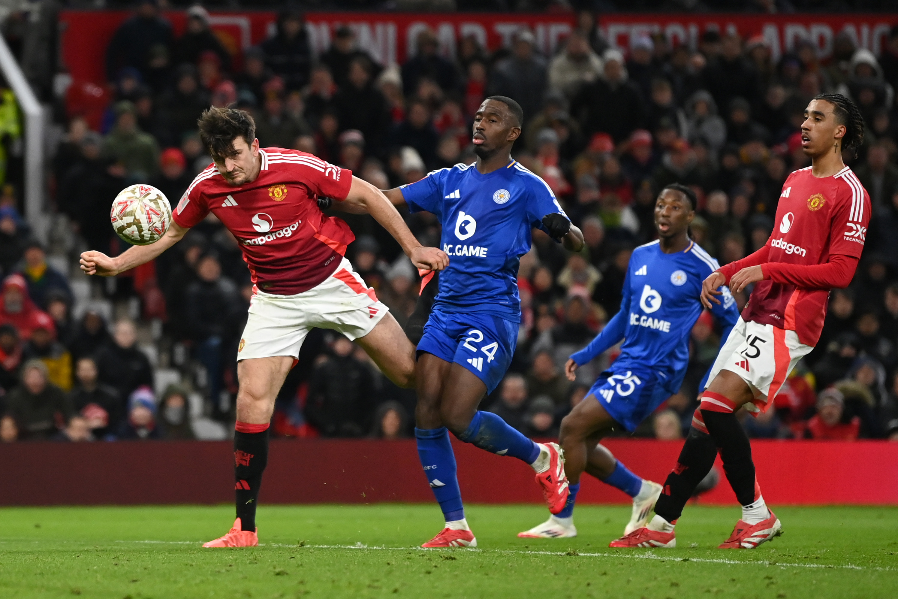 MANCHESTER, ENGLAND - FEBRUARY 07: Harry Maguire of Manchester United scores his team's second goal during the Emirates FA Cup Fourth Round match between Manchester United and Leicester City at Old Trafford on February 07, 2025 in Manchester, England