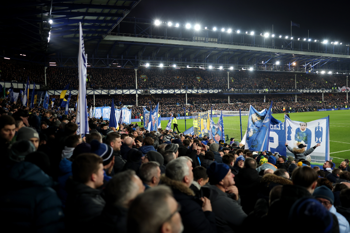 Everton fans hold up banners ahead of the final Merseyside derby at Goodison Park.