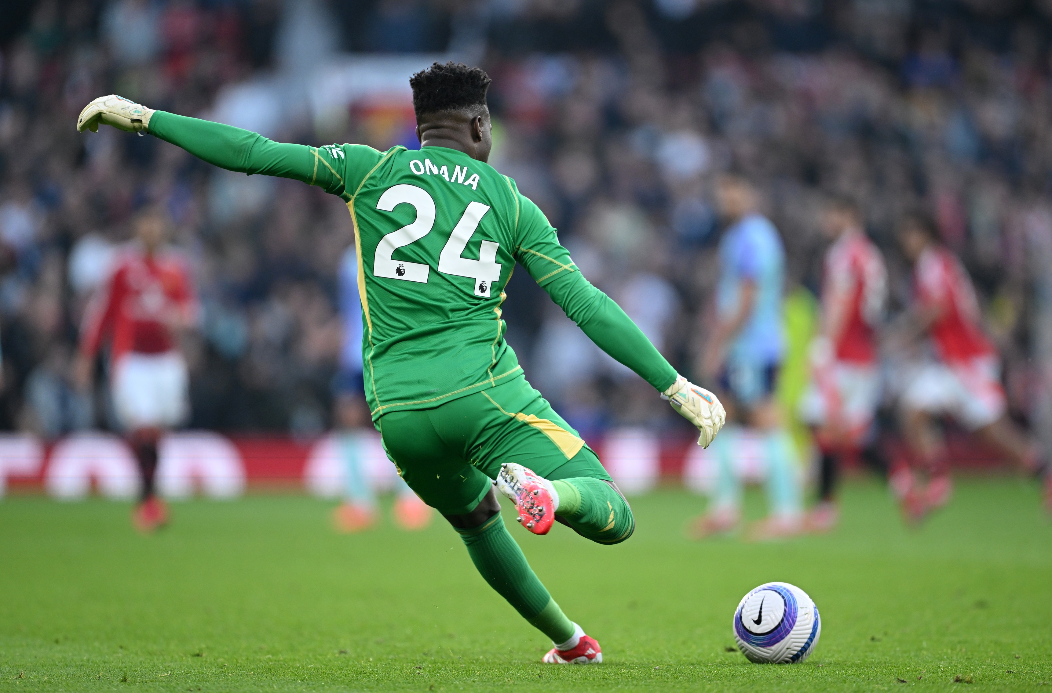 Andre Onana takes a goal kick at Old Trafford.