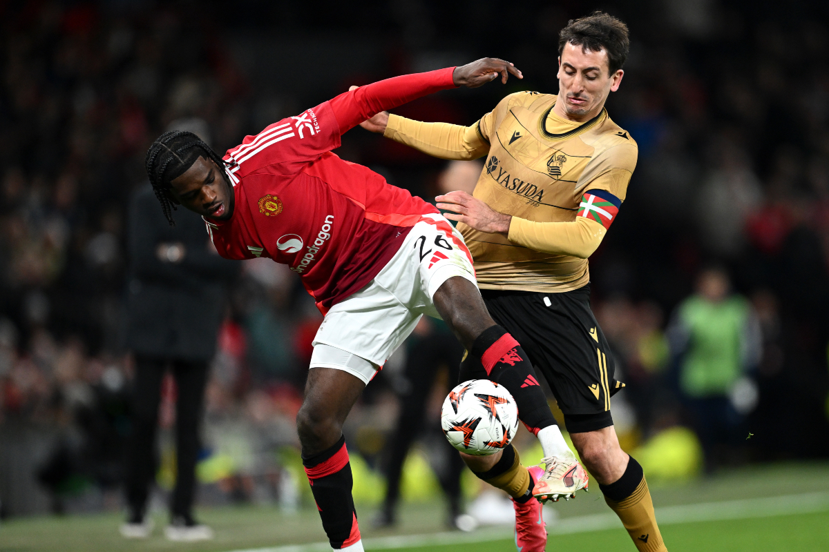 Ayden Heaven fends off Mikel Oyarzabal at Old Trafford.