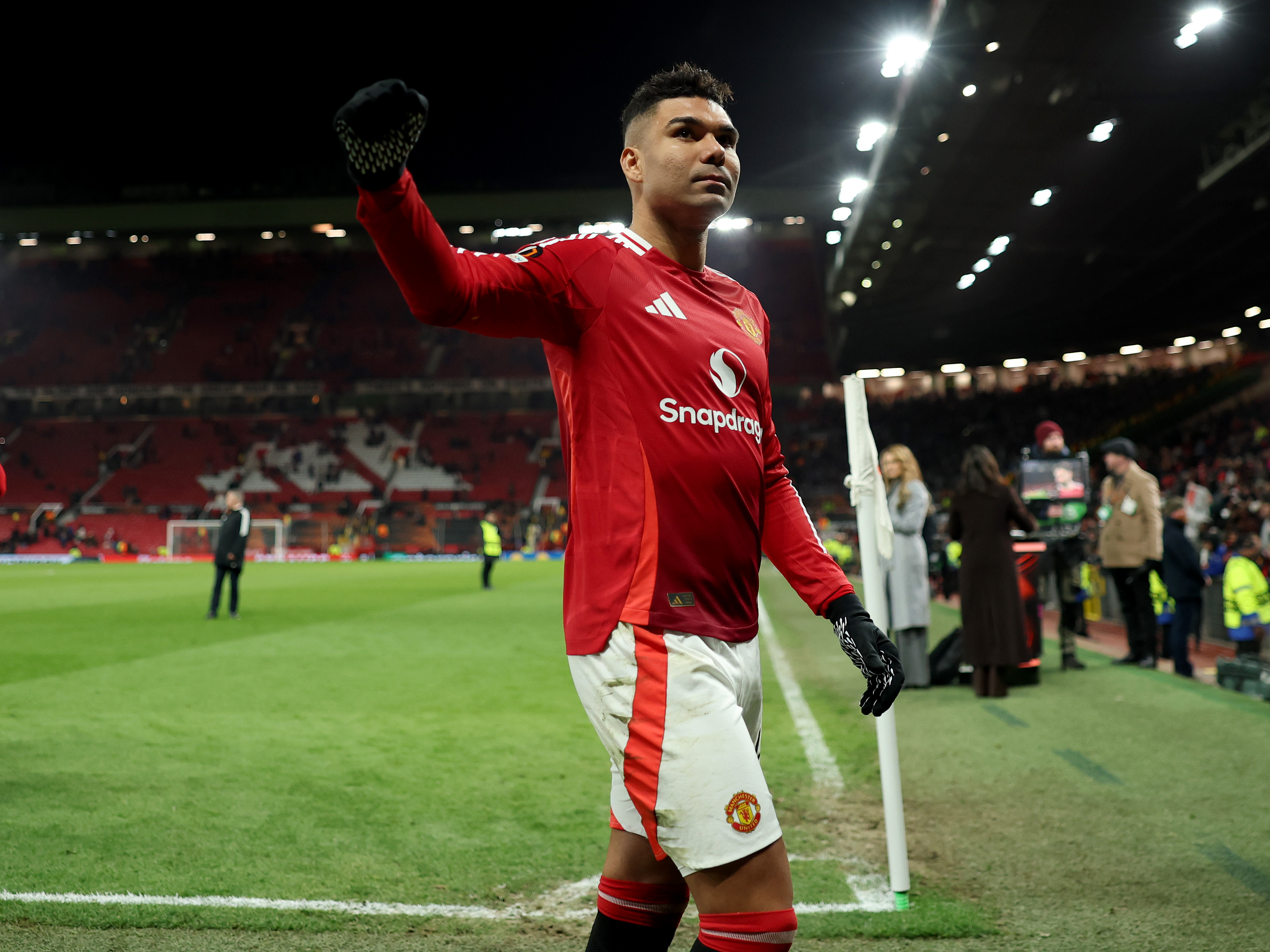 Casemiro gestures to the Man United fans as he departs down the tunnel at full-time.