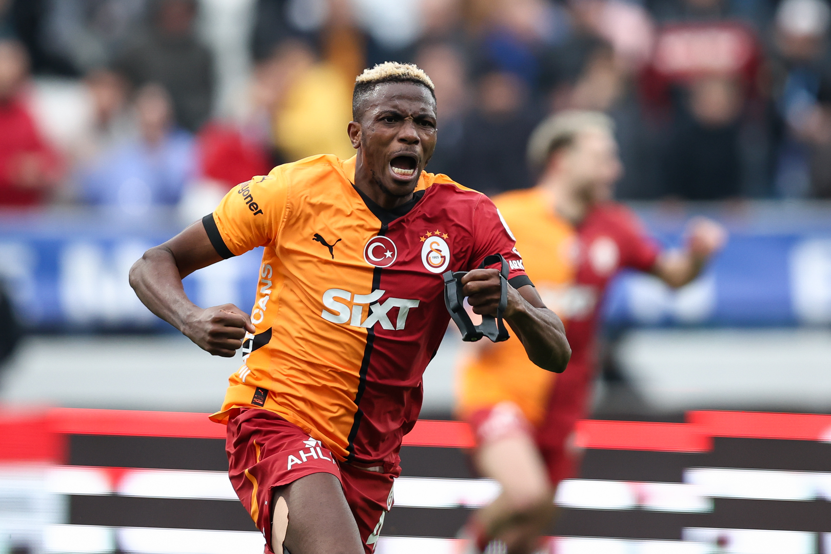 Victor Osimhen celebrates scoring a goal for Galatasaray.