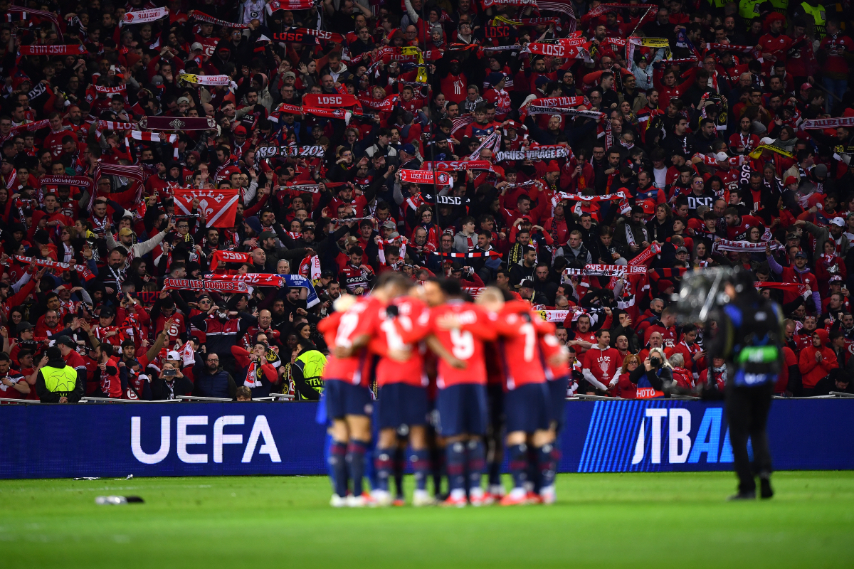 Lille huddle ahead of kick-off in the Champions League.