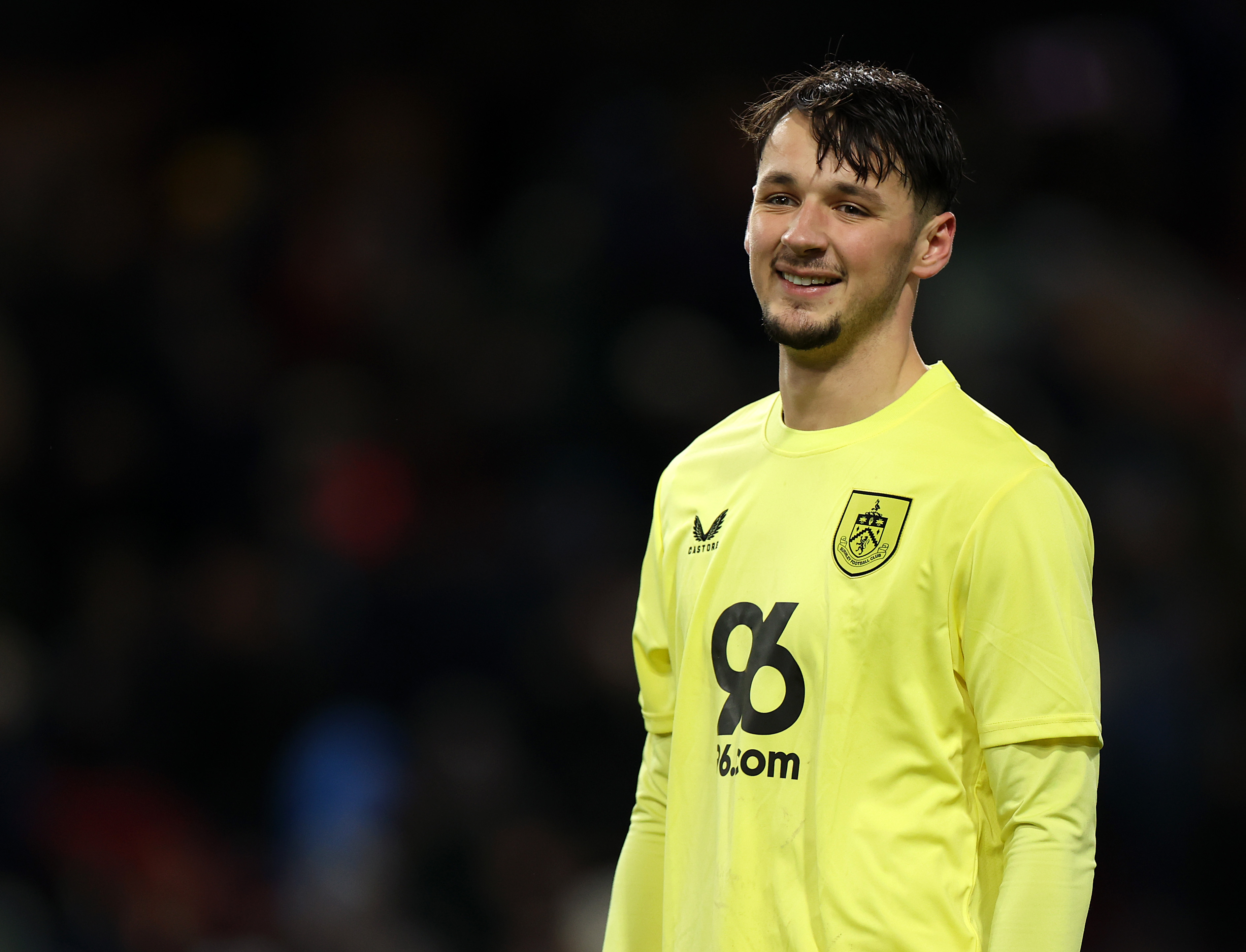 James Trafford smiles while in action for Burnley.