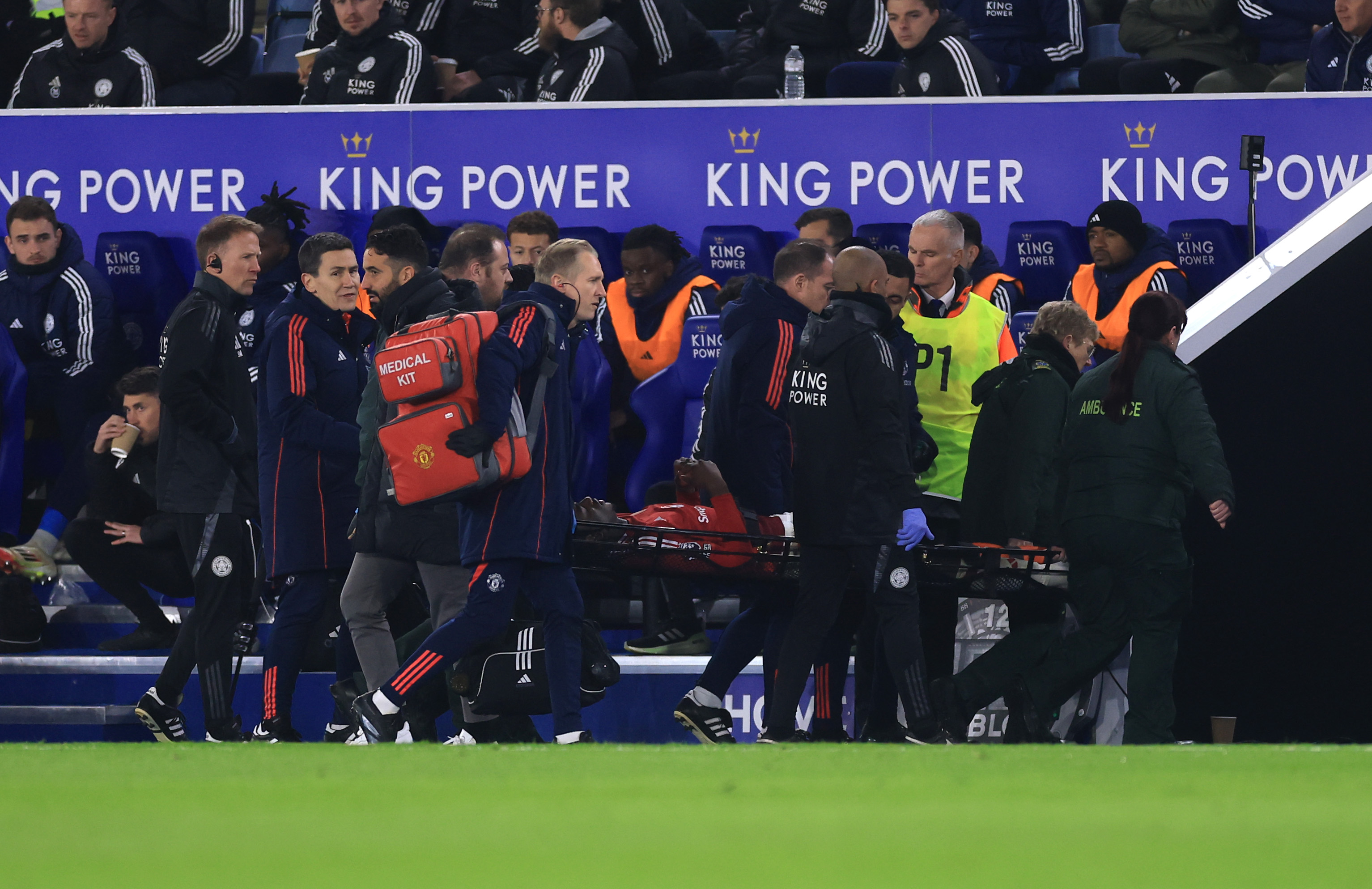 Ayden Heaven stretched off the pitch after suffering injury against Leicester