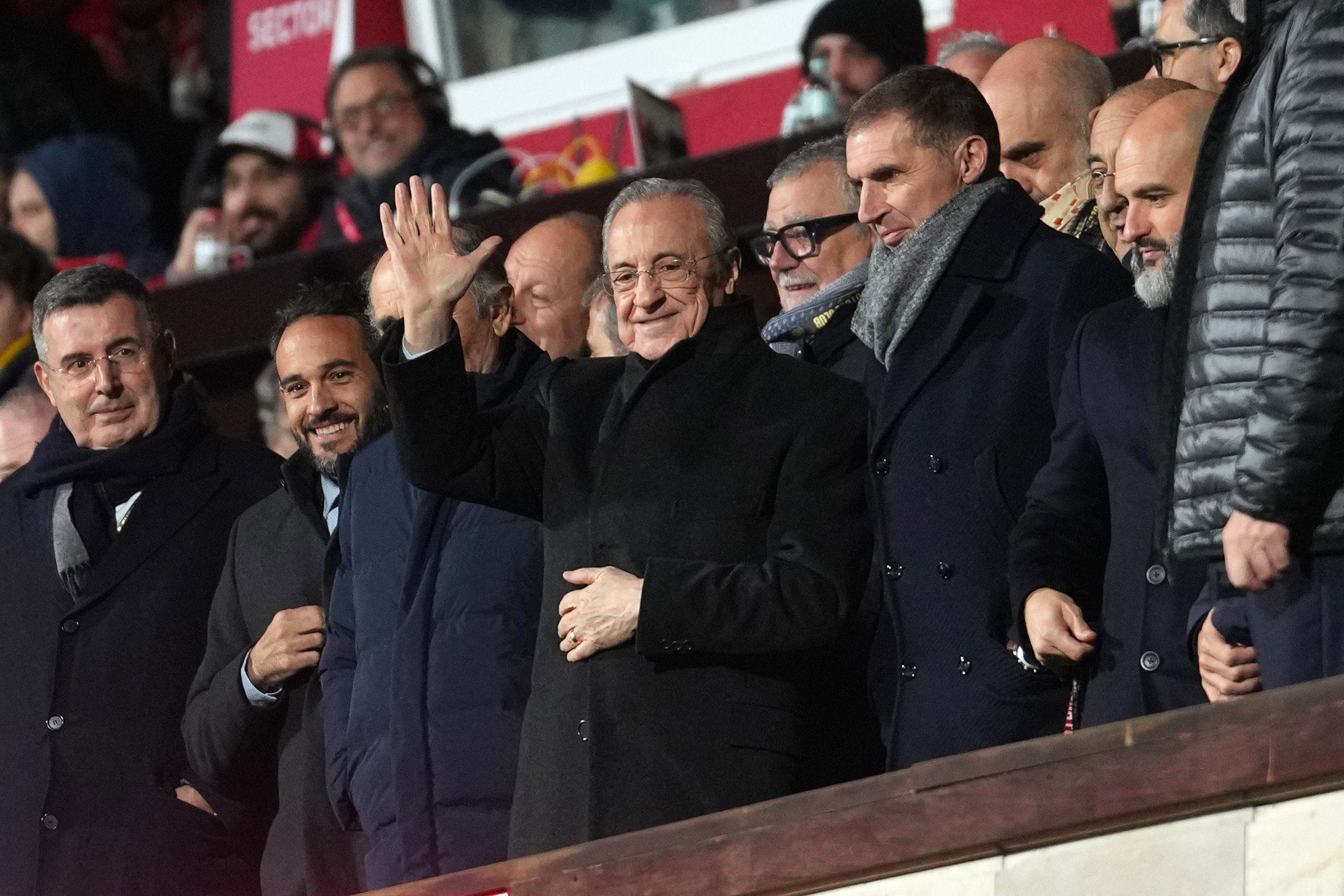 Florentino Perez waving in the stands