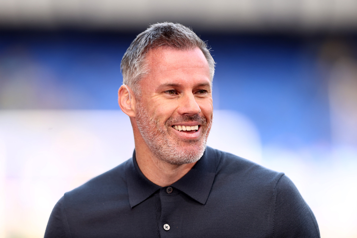 Jamie Carragher smiling during public appearance