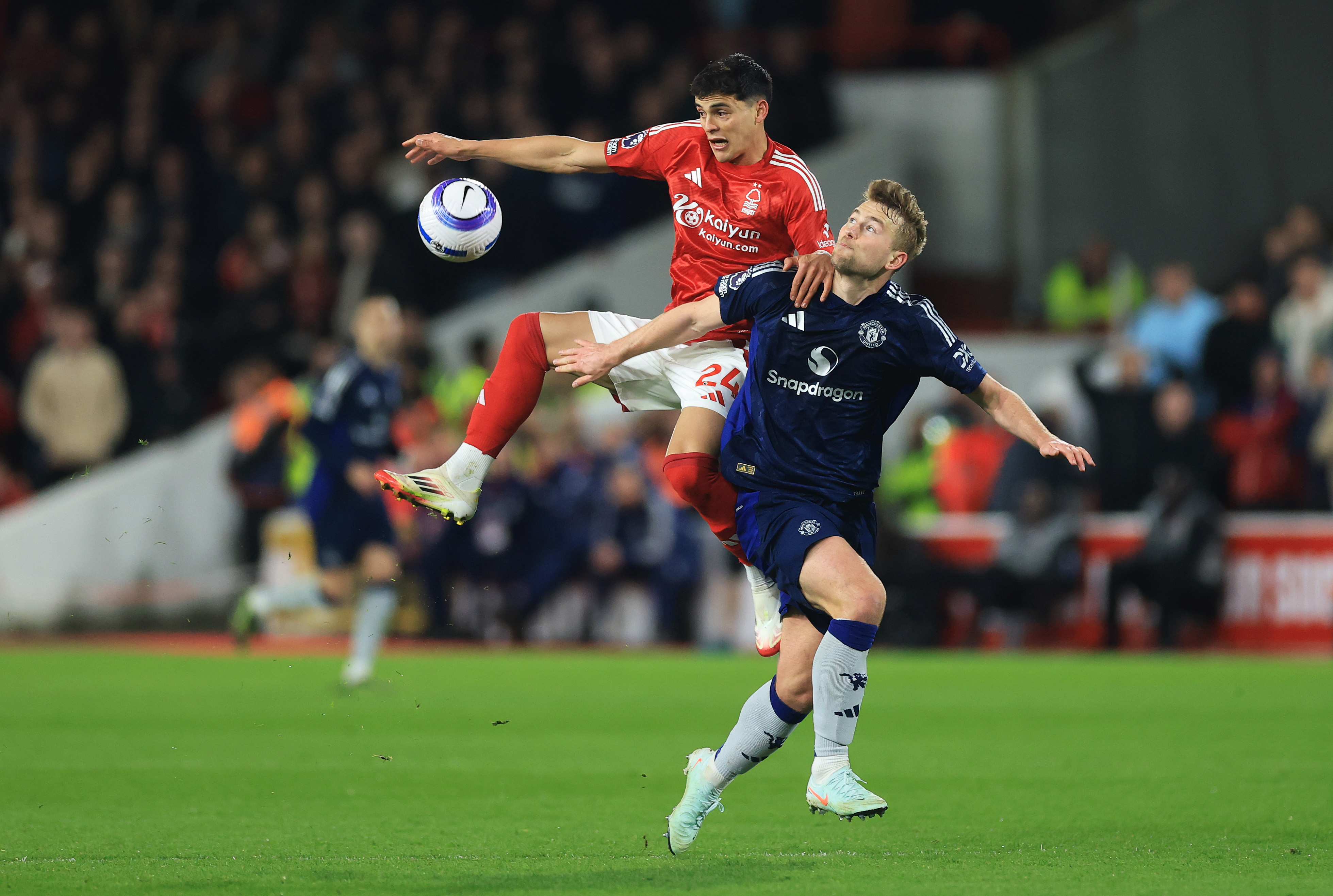 Matthijs de Ligt vies for the ball with Ramon Sosa at the City Ground.