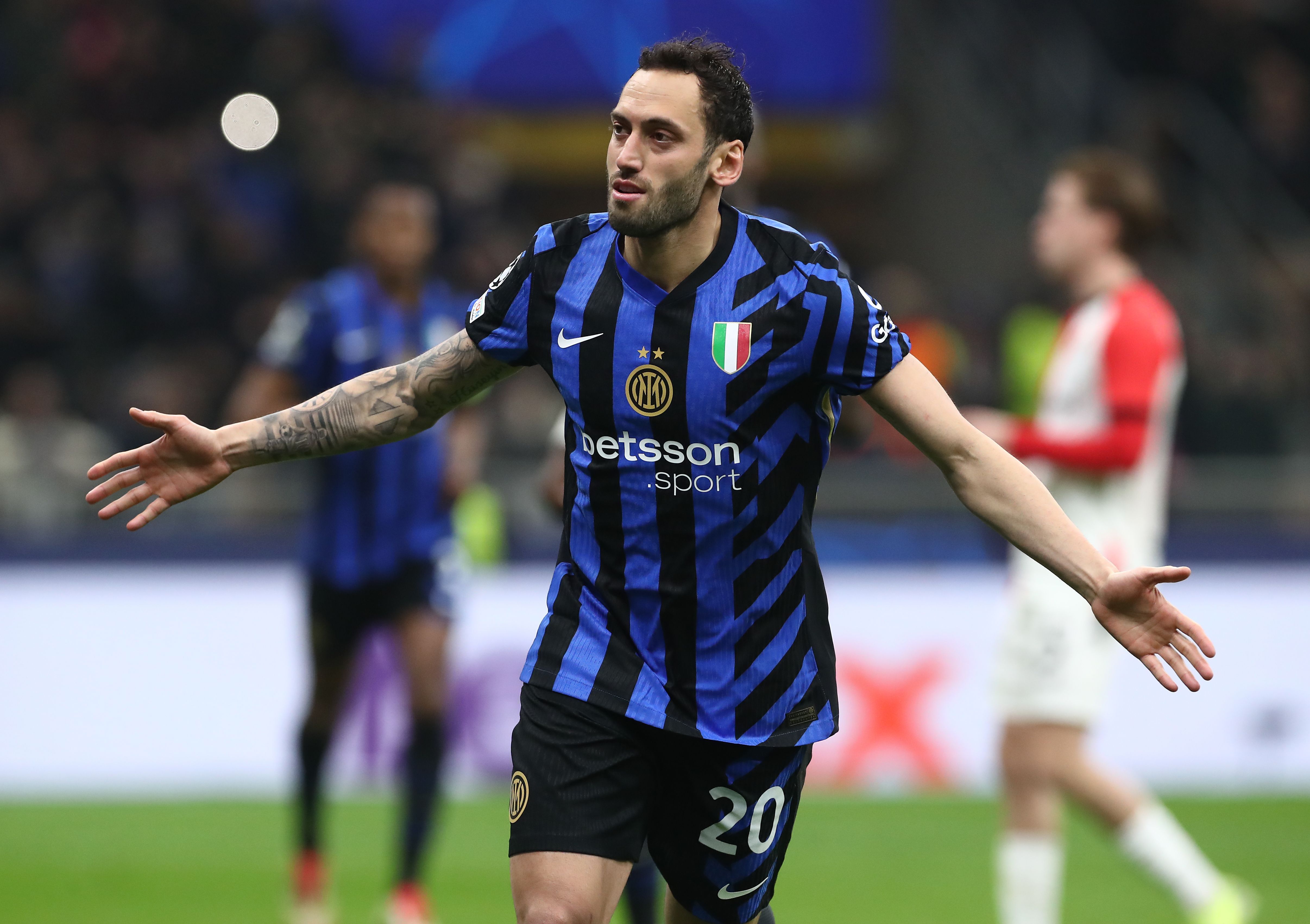Hakan Calhanoglu celebrates scoring for Inter Milan