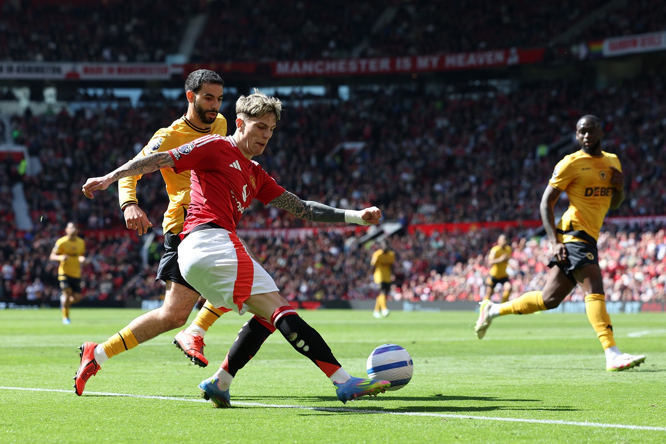 Alejandro Garnacho takes a shot against Wolves at Old Trafford.