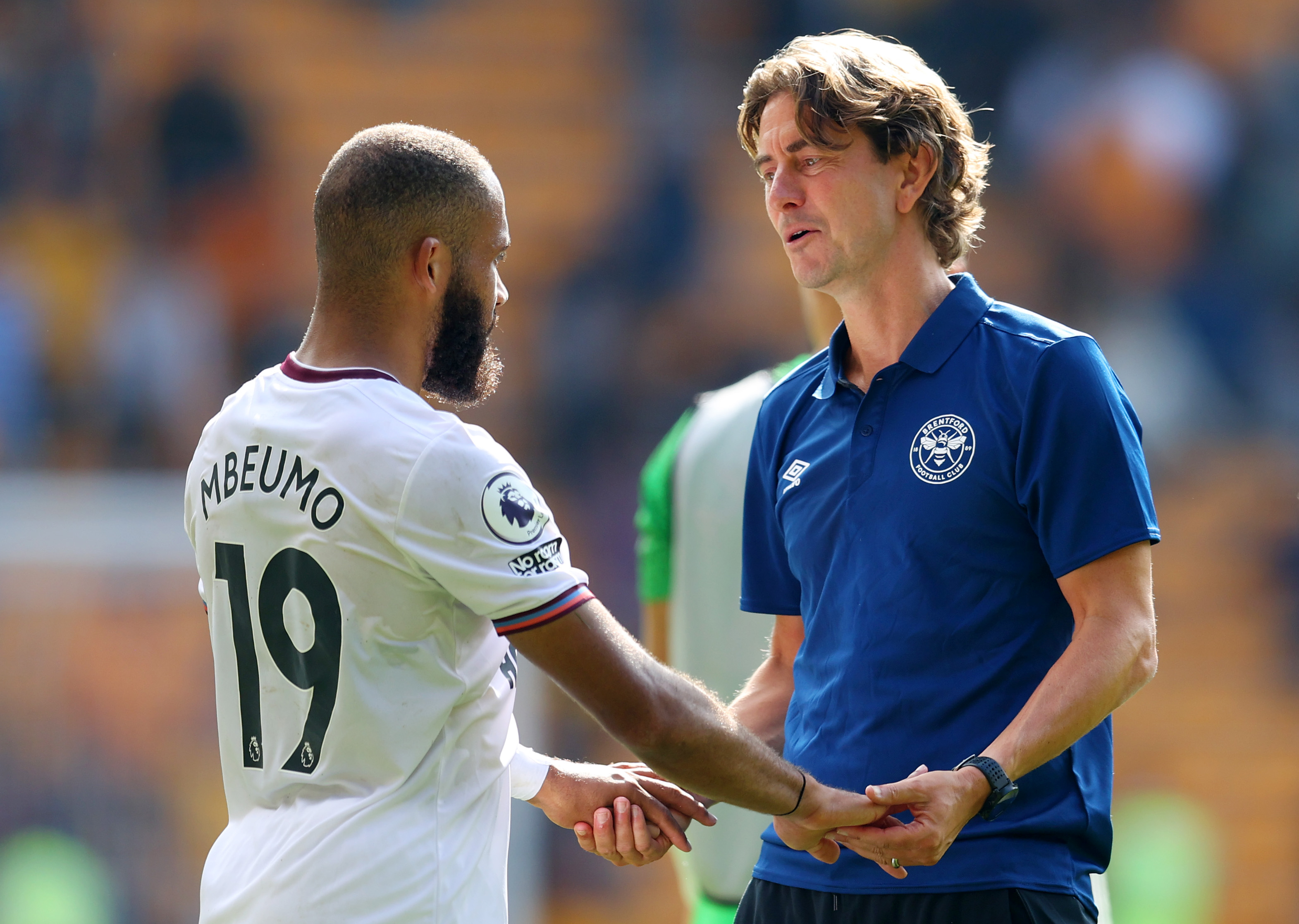 Thomas Frank chats with Bryan Mbeumo at full-time.