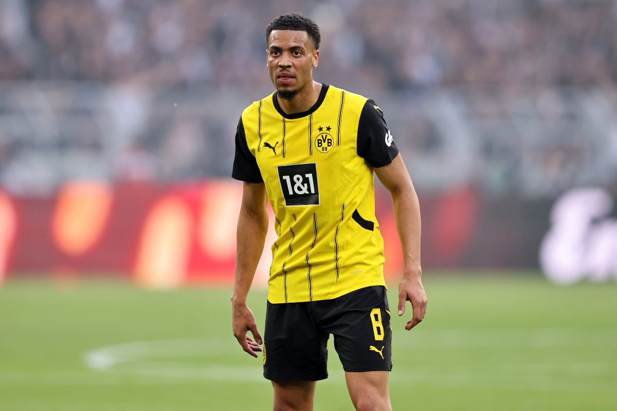 Felix Nmecha looks on while in action for Borrusia Dortmund.