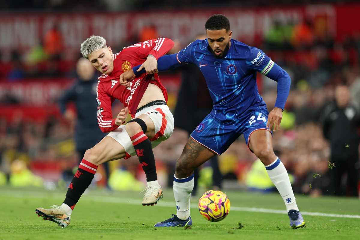 Alejandro Garnacho vies with Reece James.