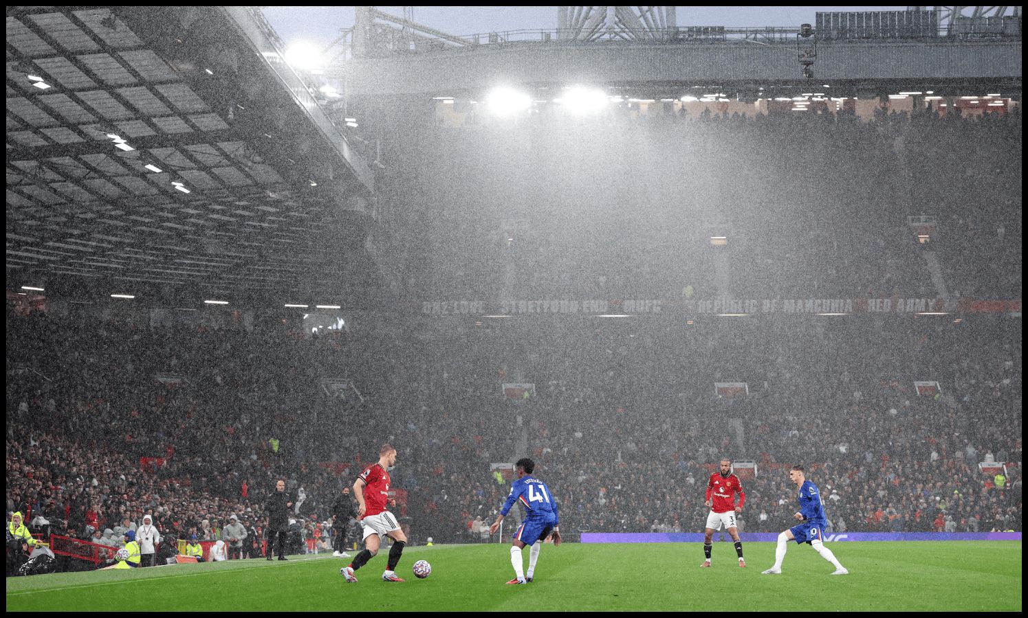 A general view of Man United and Chelsea players in action at Old Trafford.