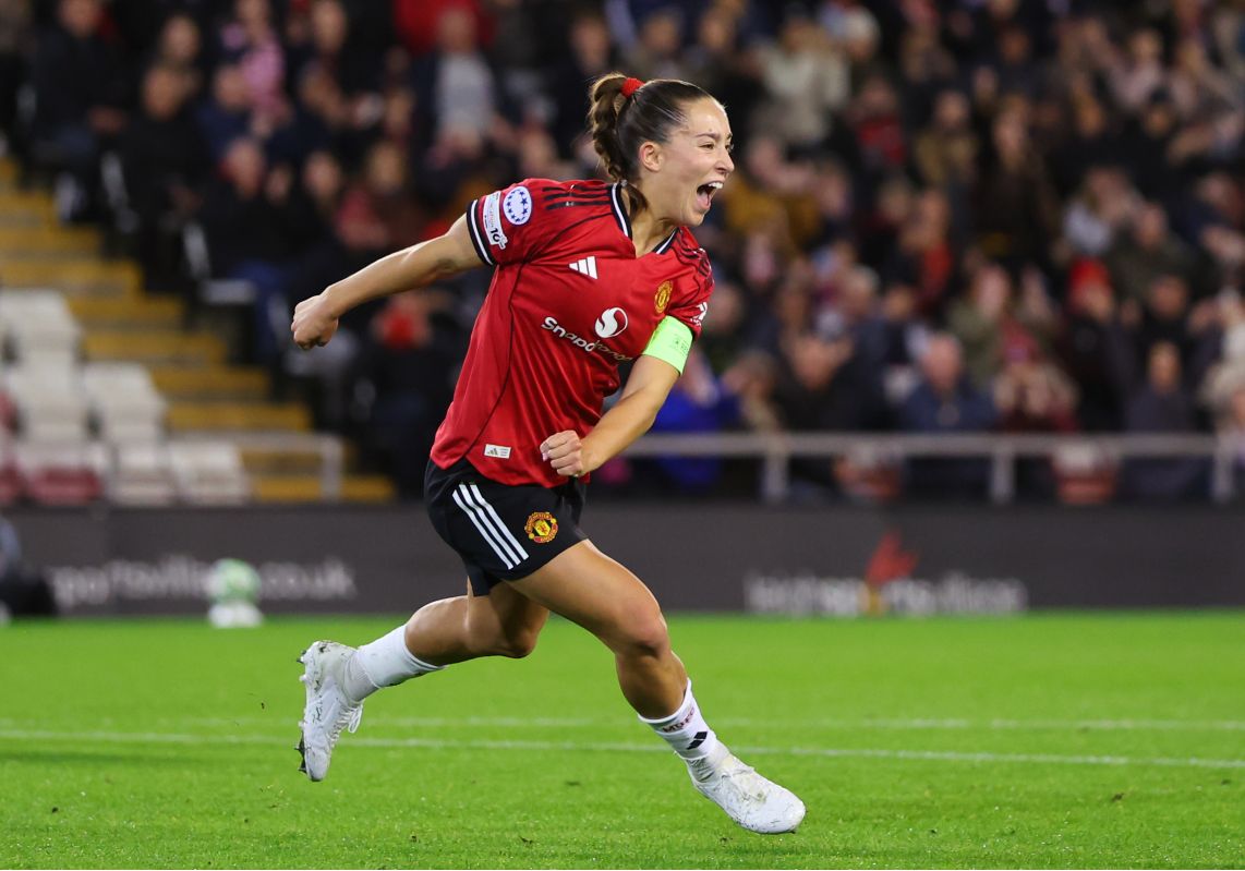 Maya Le Tissier celebrates after scoring for Man United Women in the Champions League.