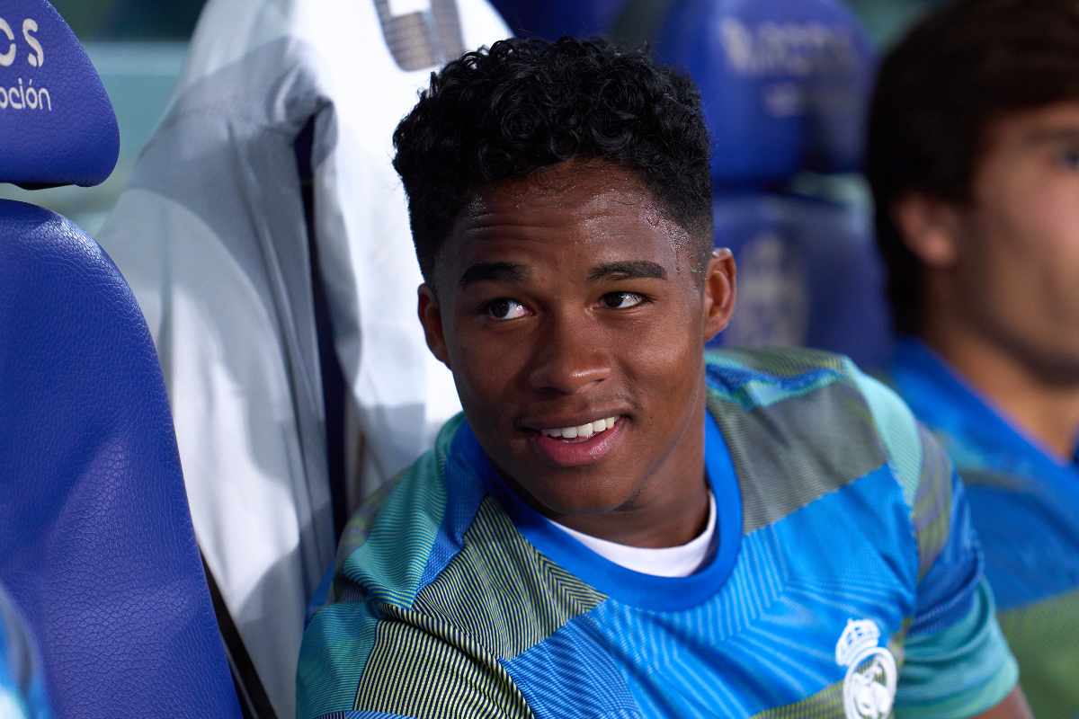 Endrick watches on from the Real Madrid bench.