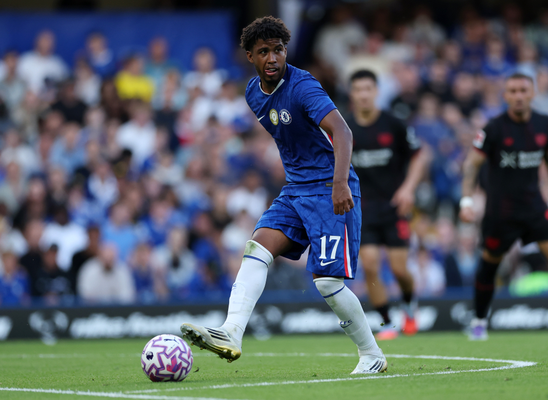 Andrey Santos plays the ball while in action for Chelsea.