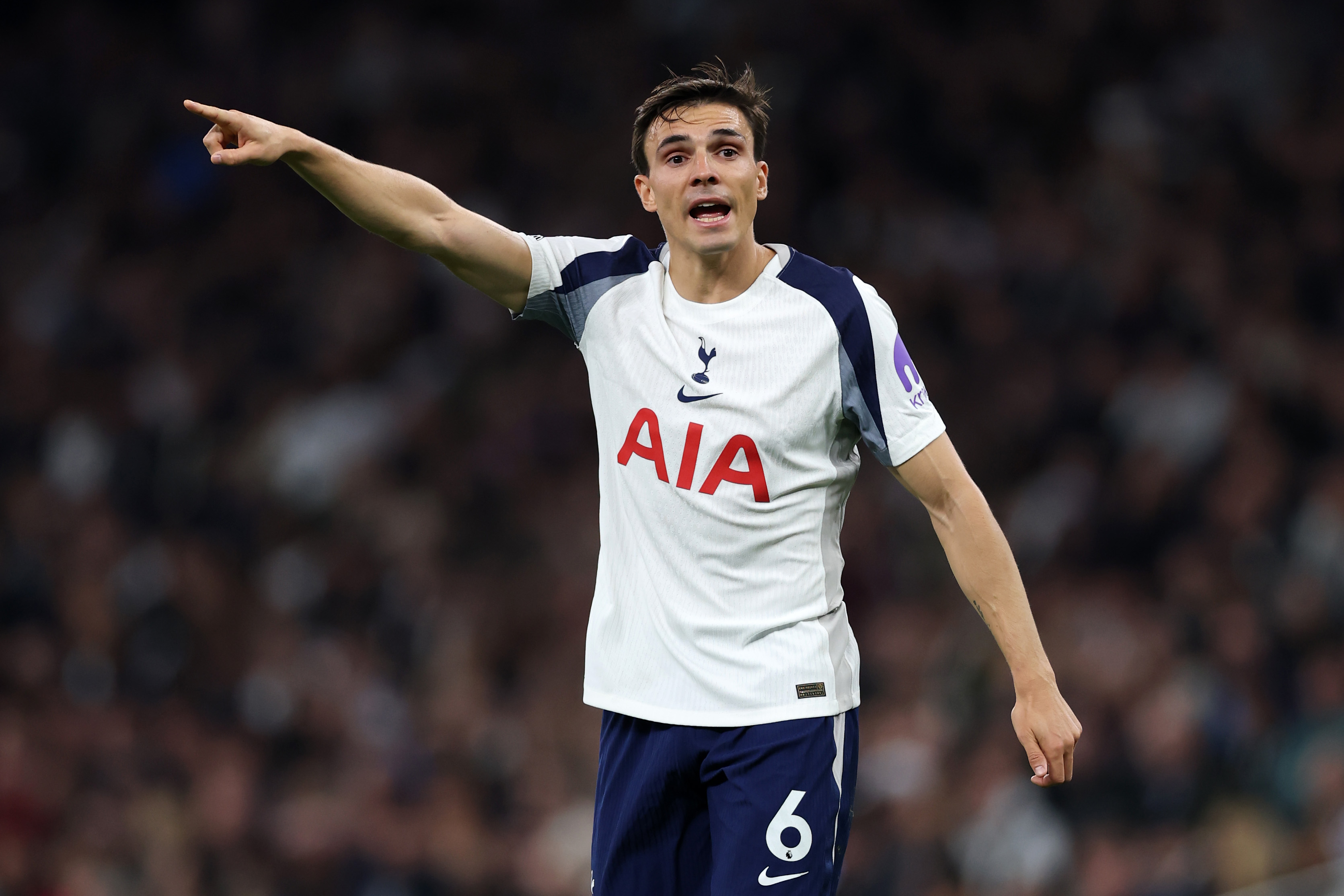 Joao Palhinha gestures while in action for Tottenham against Wolves.
