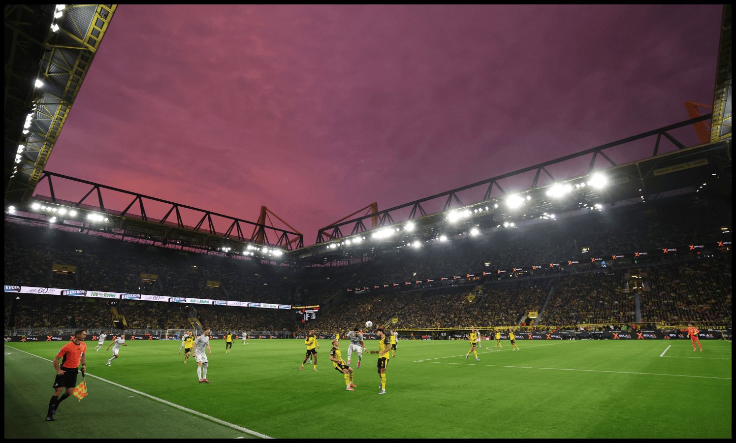 Borussia Dortmund players vie for the ball.